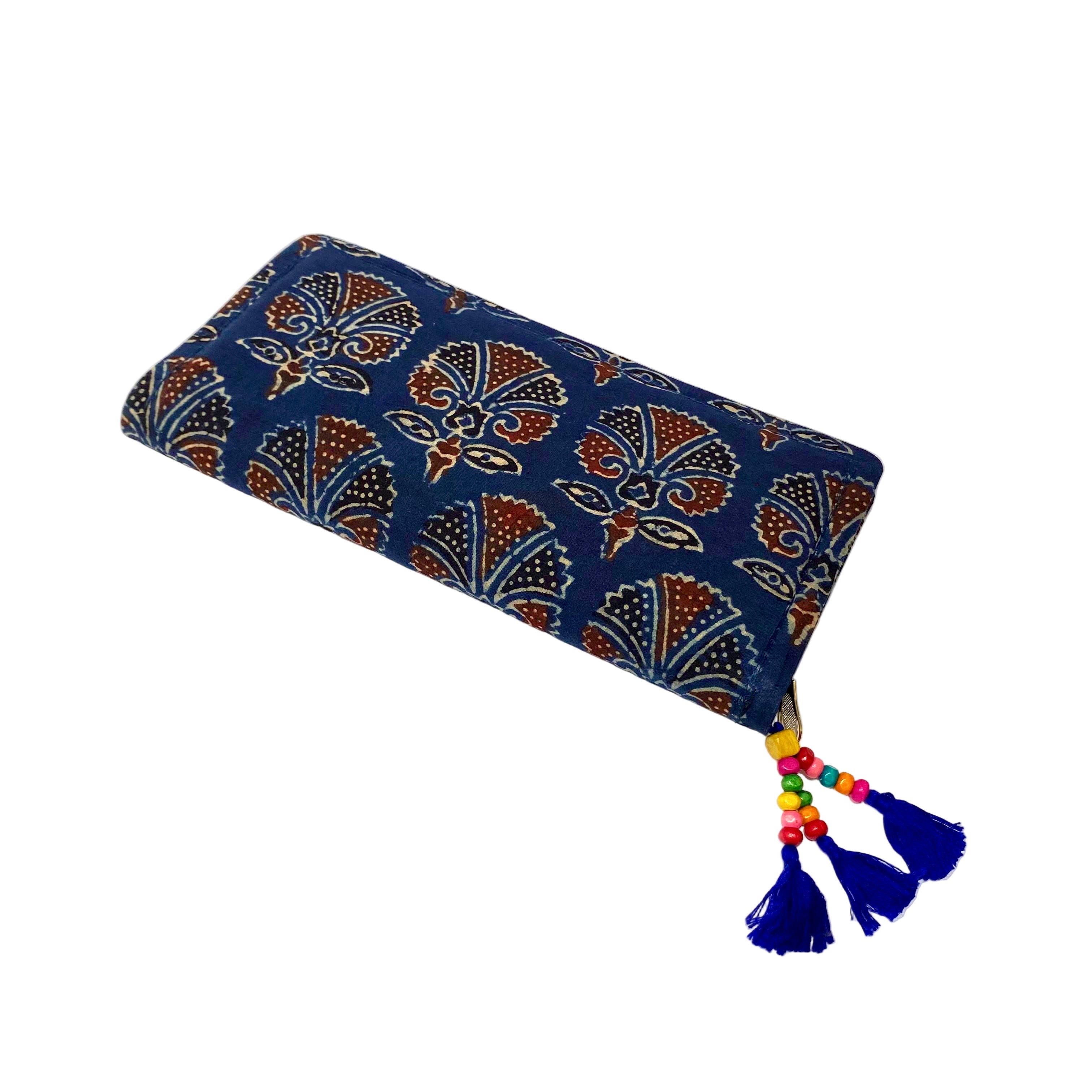 Blue patterned pouch with colorful tassels on a white background