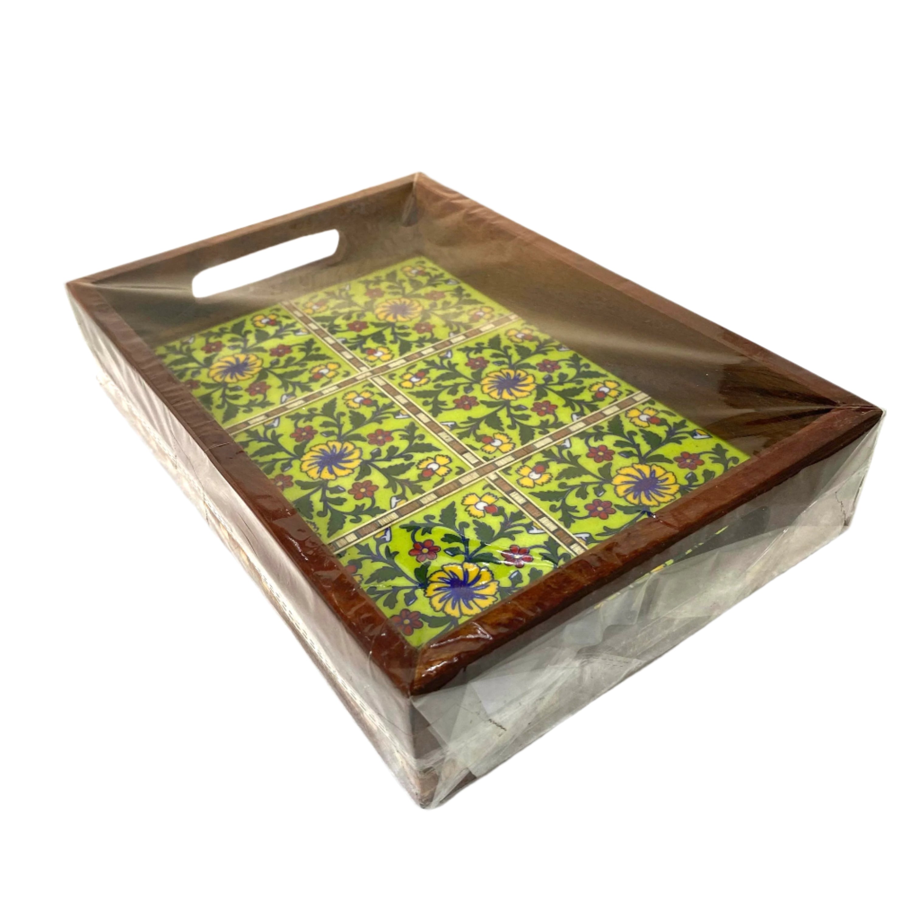 Decorative tray with floral pattern on a white surface