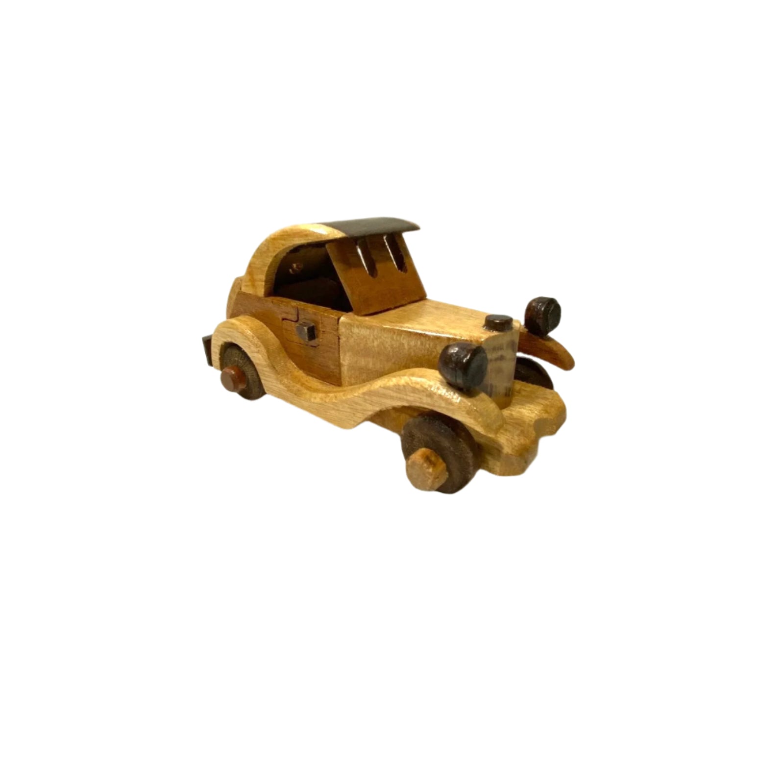 Wooden toy car on a white surface with a textured white background