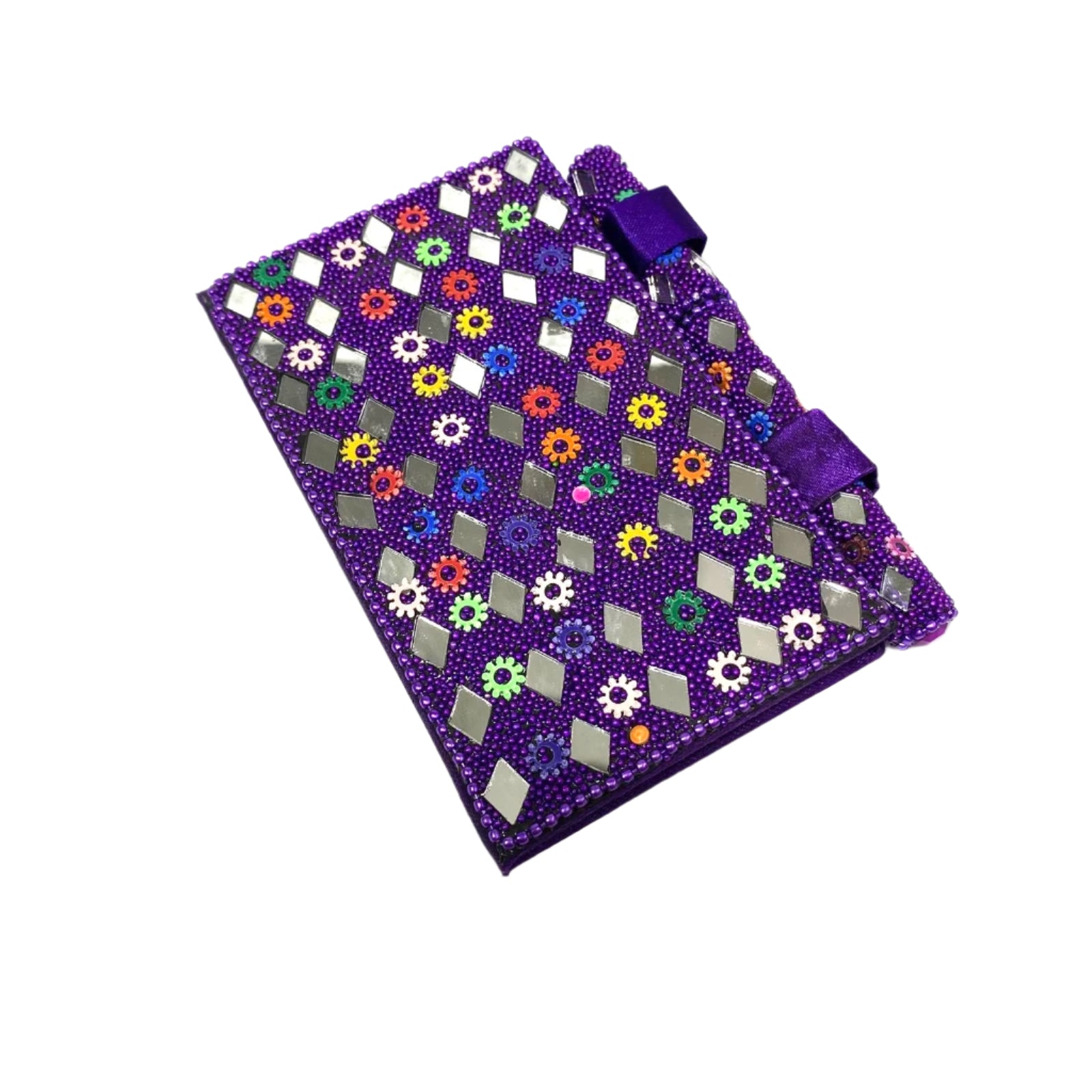 Purple fabric with colorful geometric pattern on a white background