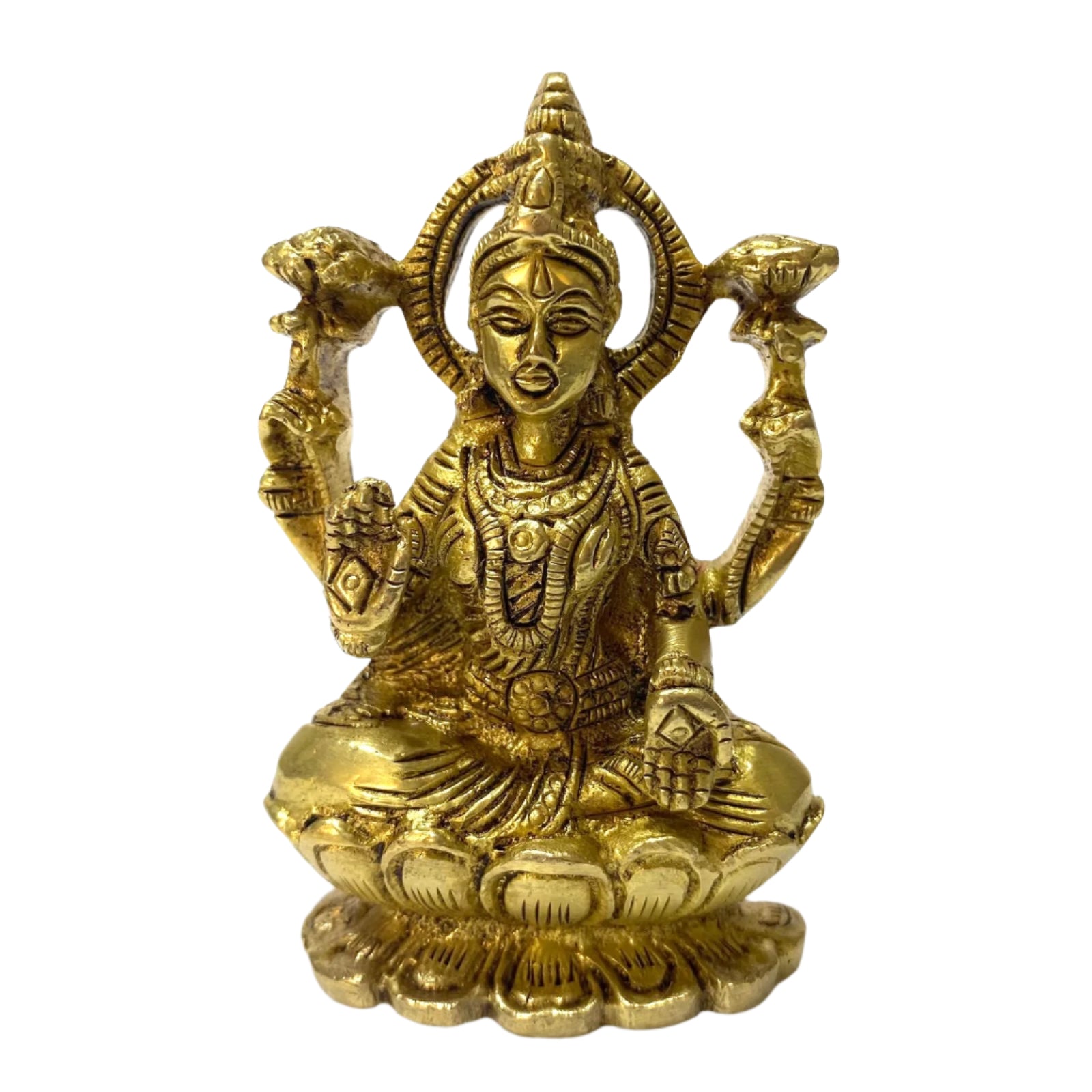 Gold-colored statue of a seated figure with intricate details on a white background