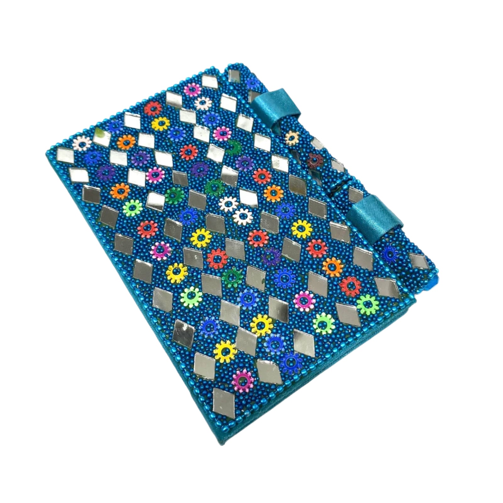 Decorative notebook with mosaic design and blue ribbon on a white background