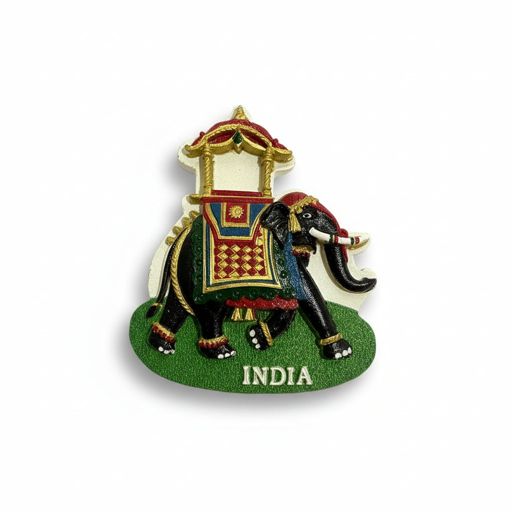 Decorative elephant ornament with 'India' text on a white background