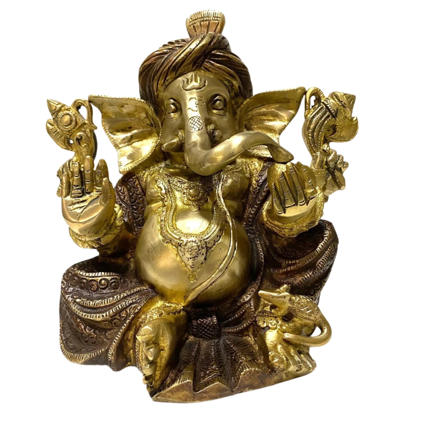 Brass statue of a deity with intricate designs on a white background