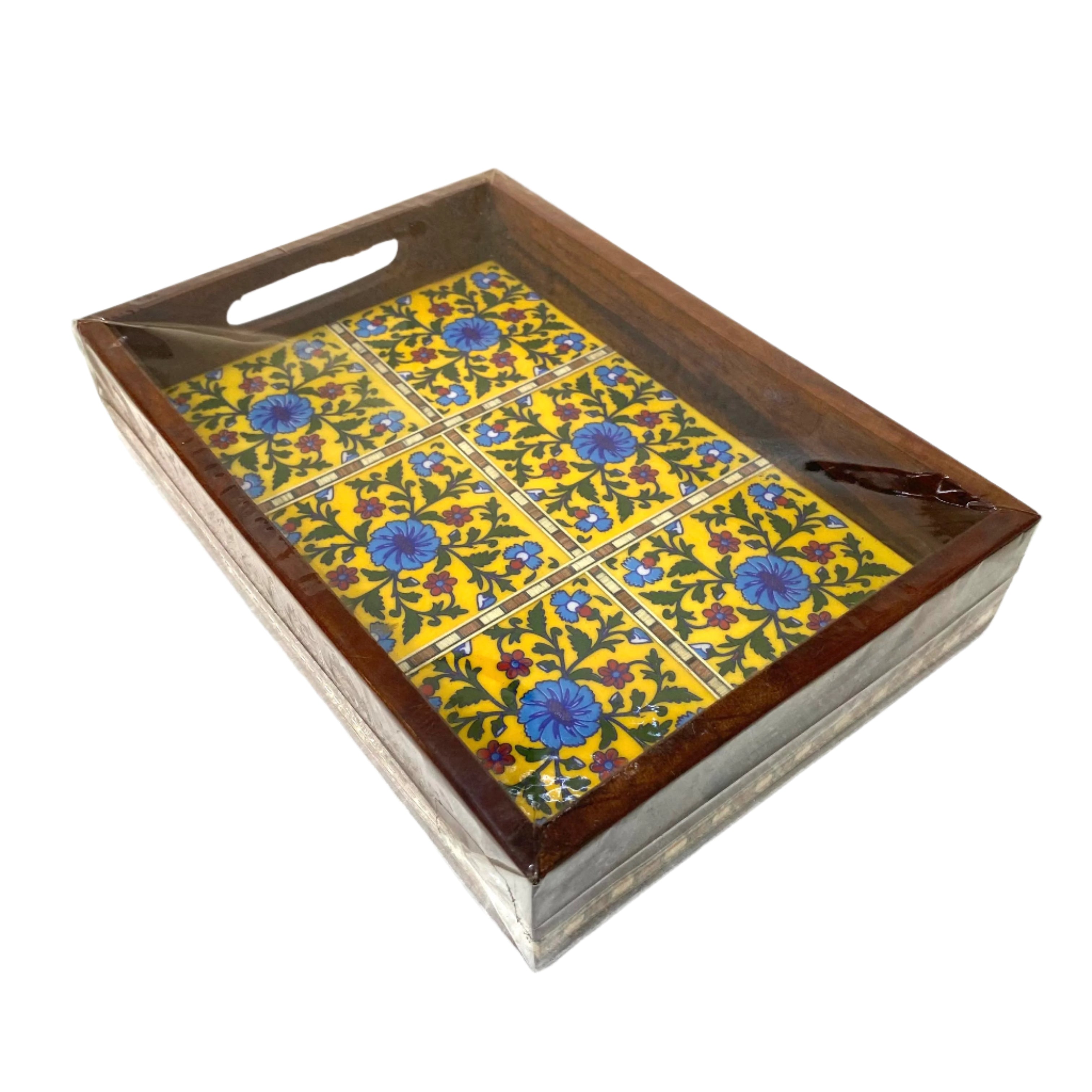 Decorative tray with floral pattern on a white surface