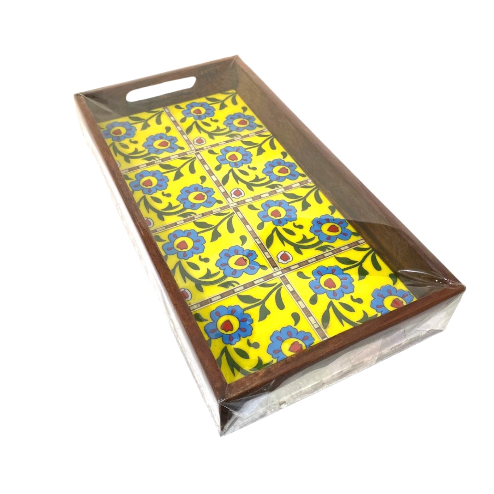 Decorative tray with floral pattern on a white surface