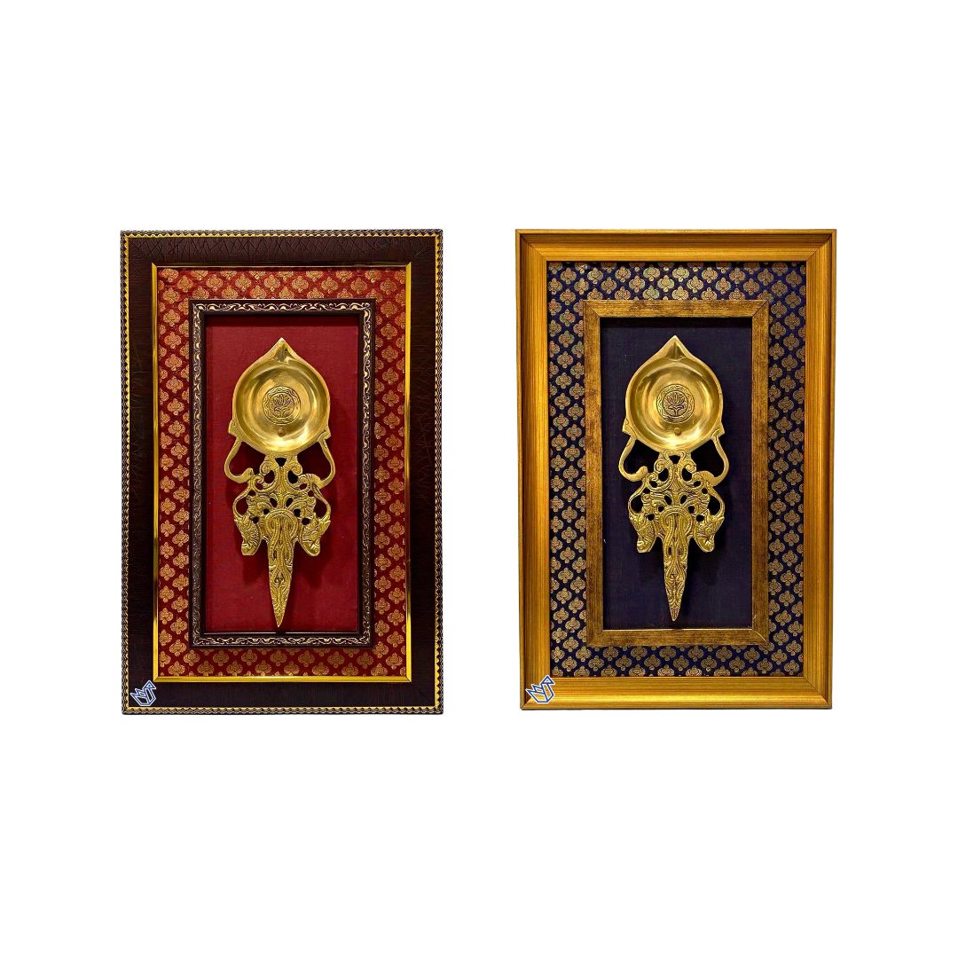 Two decorative wall hangings with gold and brown frames on a white background