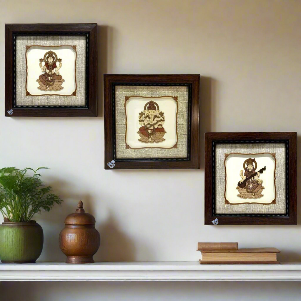 Three framed wall art pieces with religious iconography on a white background