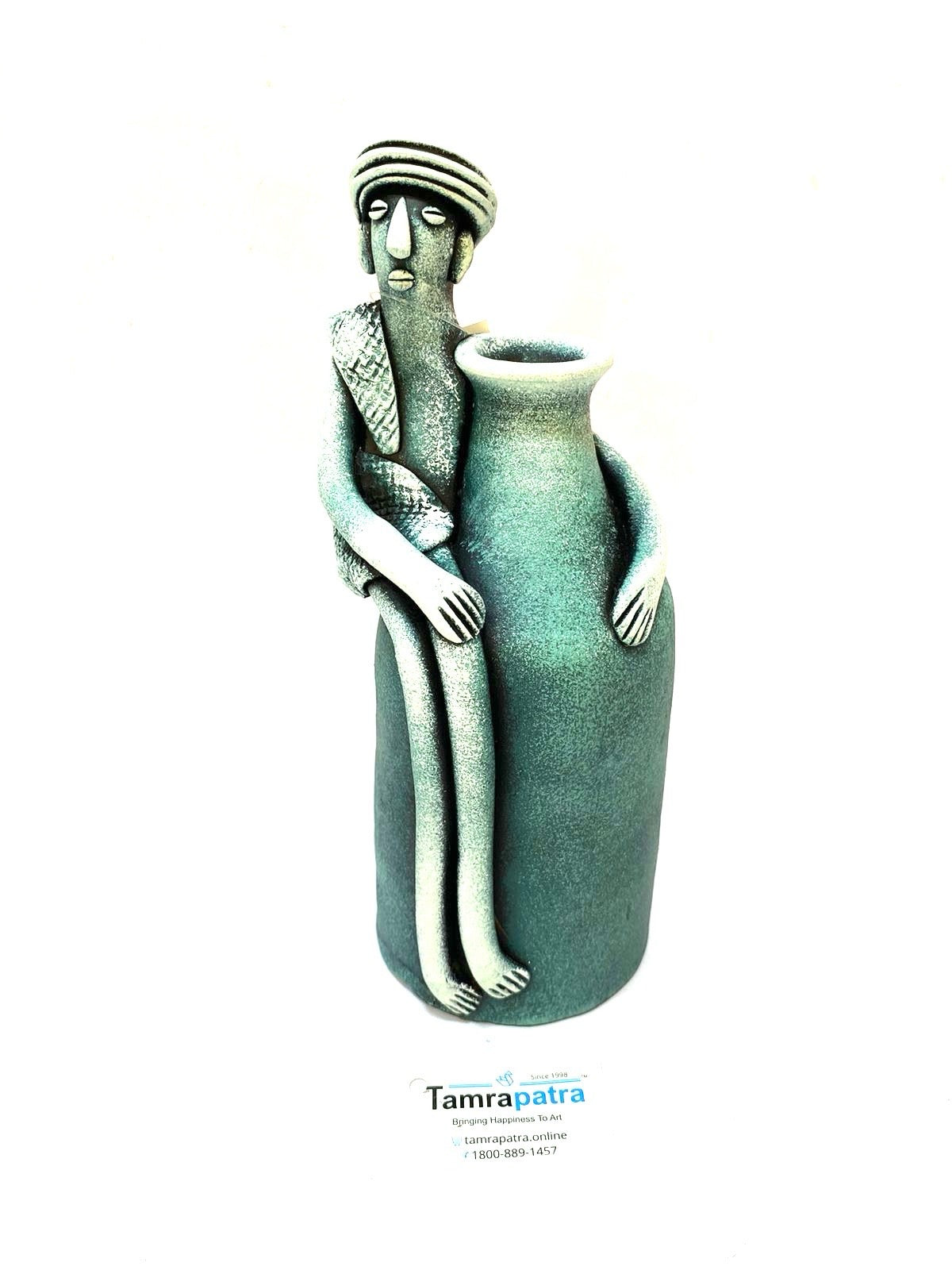 Tribal Man Sitting on Colorful Pot Exclusive Pottery Decoration By Tamrapatra - Tamrapatra