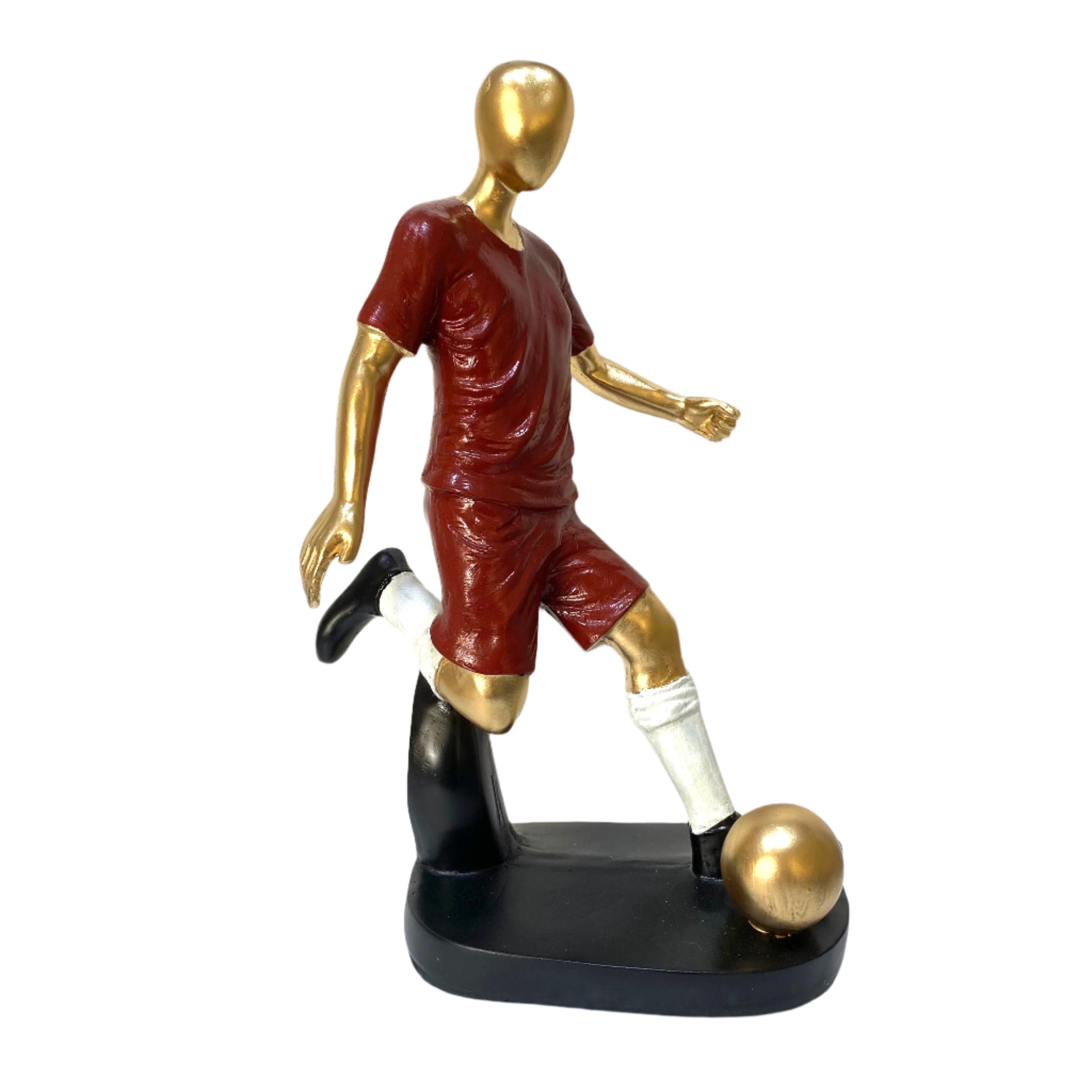Statue of a soccer player in red and gold uniform with a soccer ball on a white background