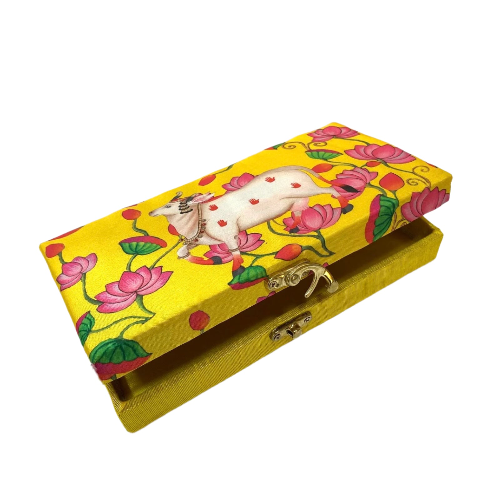 Decorative yellow box with floral design and cow illustration on a white background