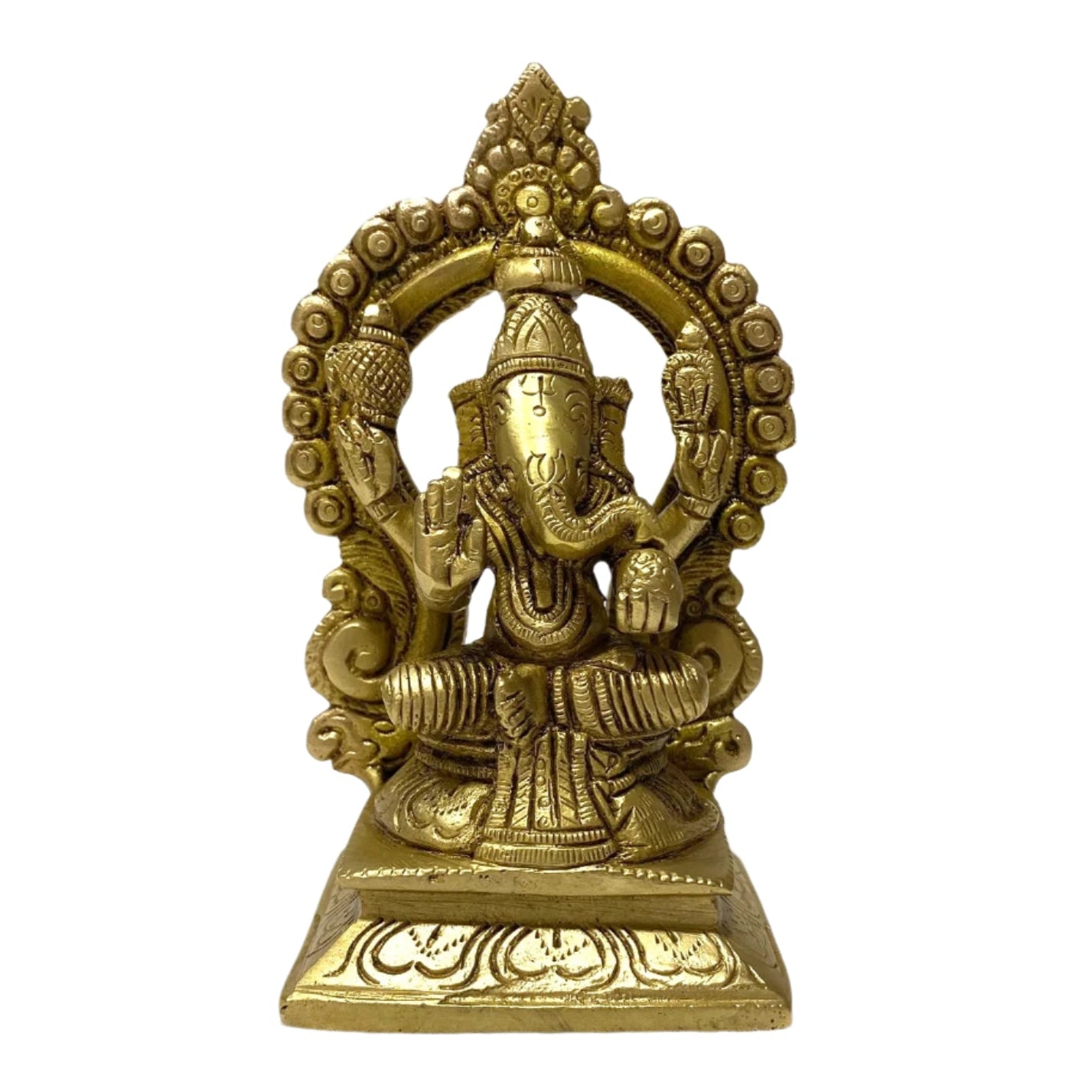 Brass statue of a deity on a white background
