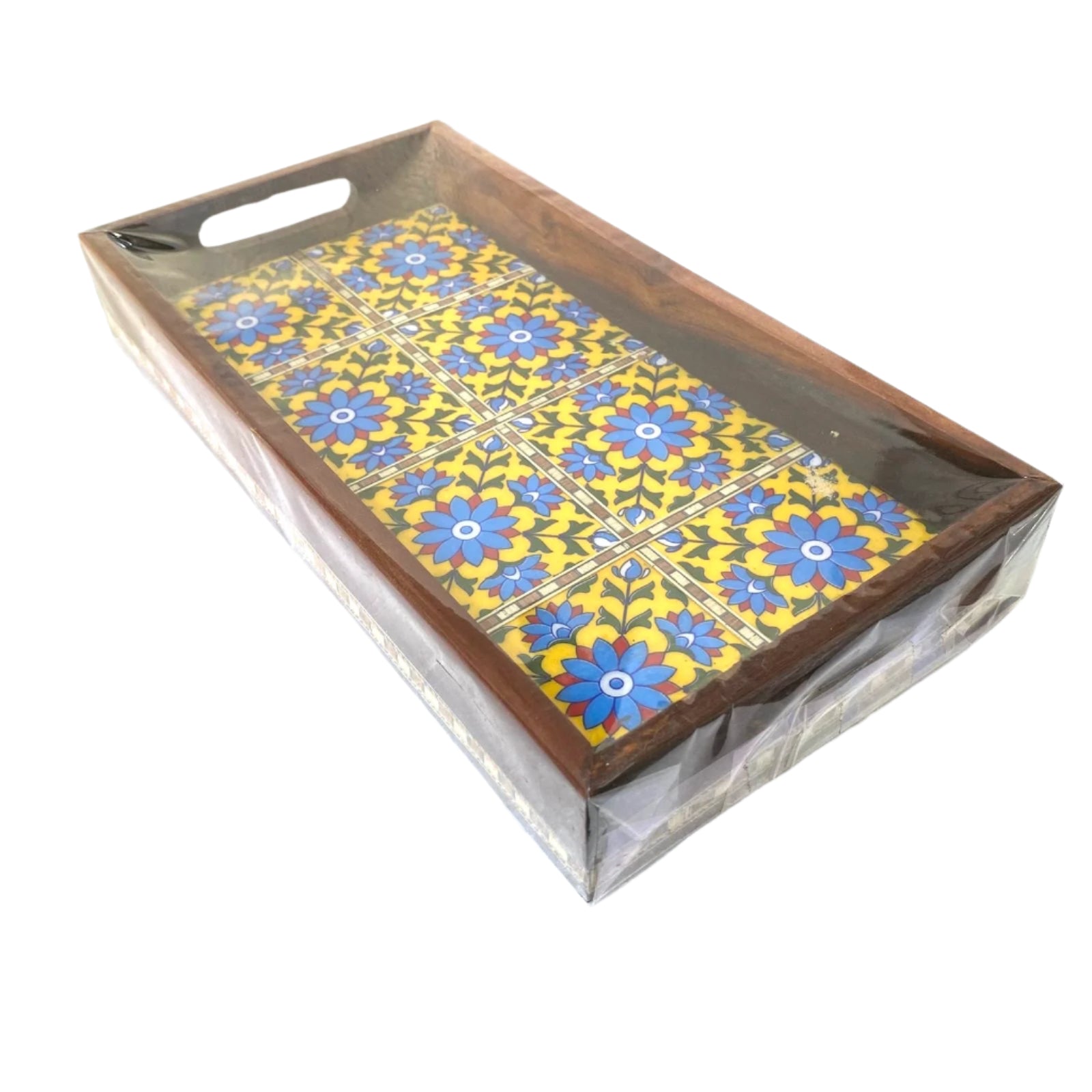 Decorative tray with floral pattern on a white surface