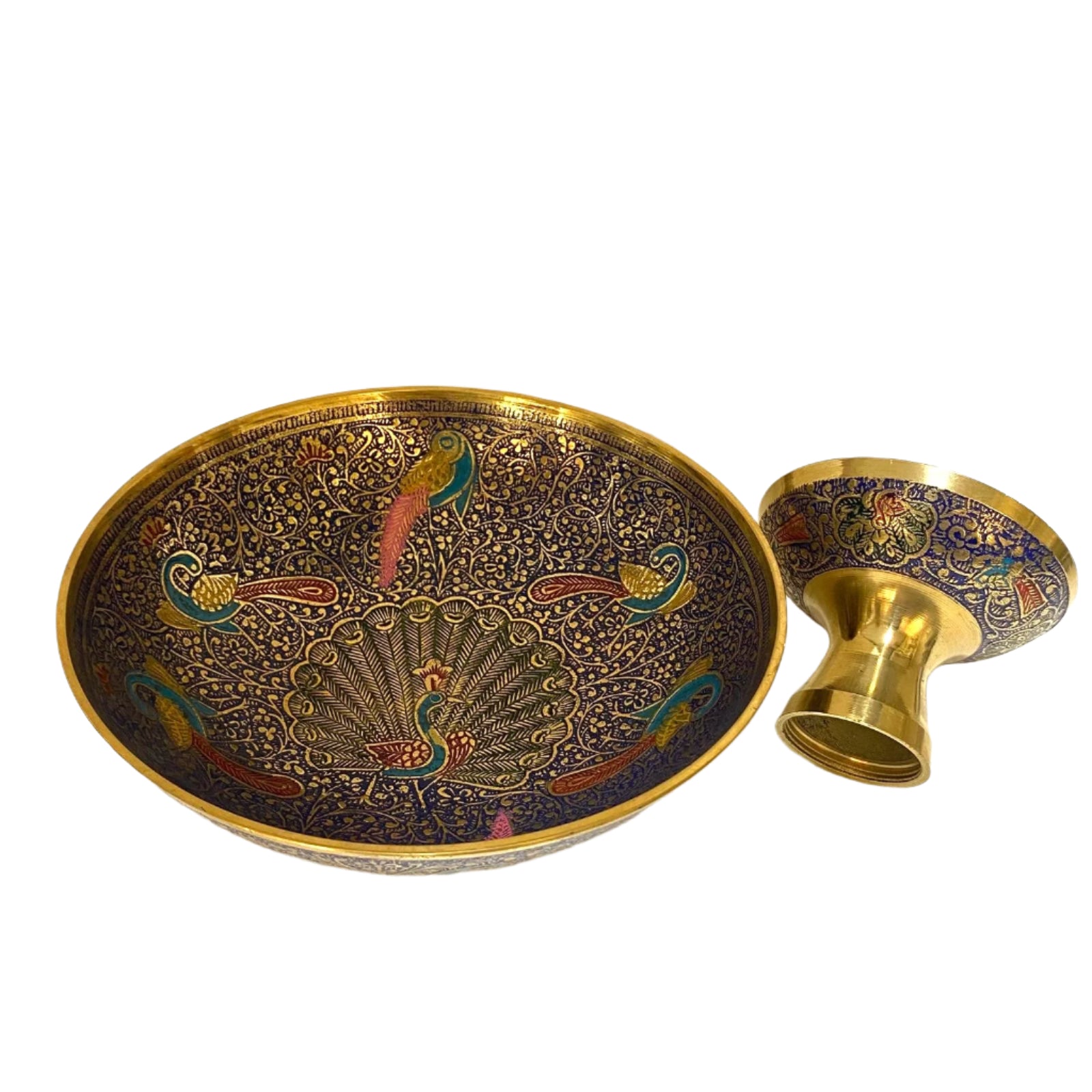 Decorative brass bowl and cup with intricate peacock designs on a white background