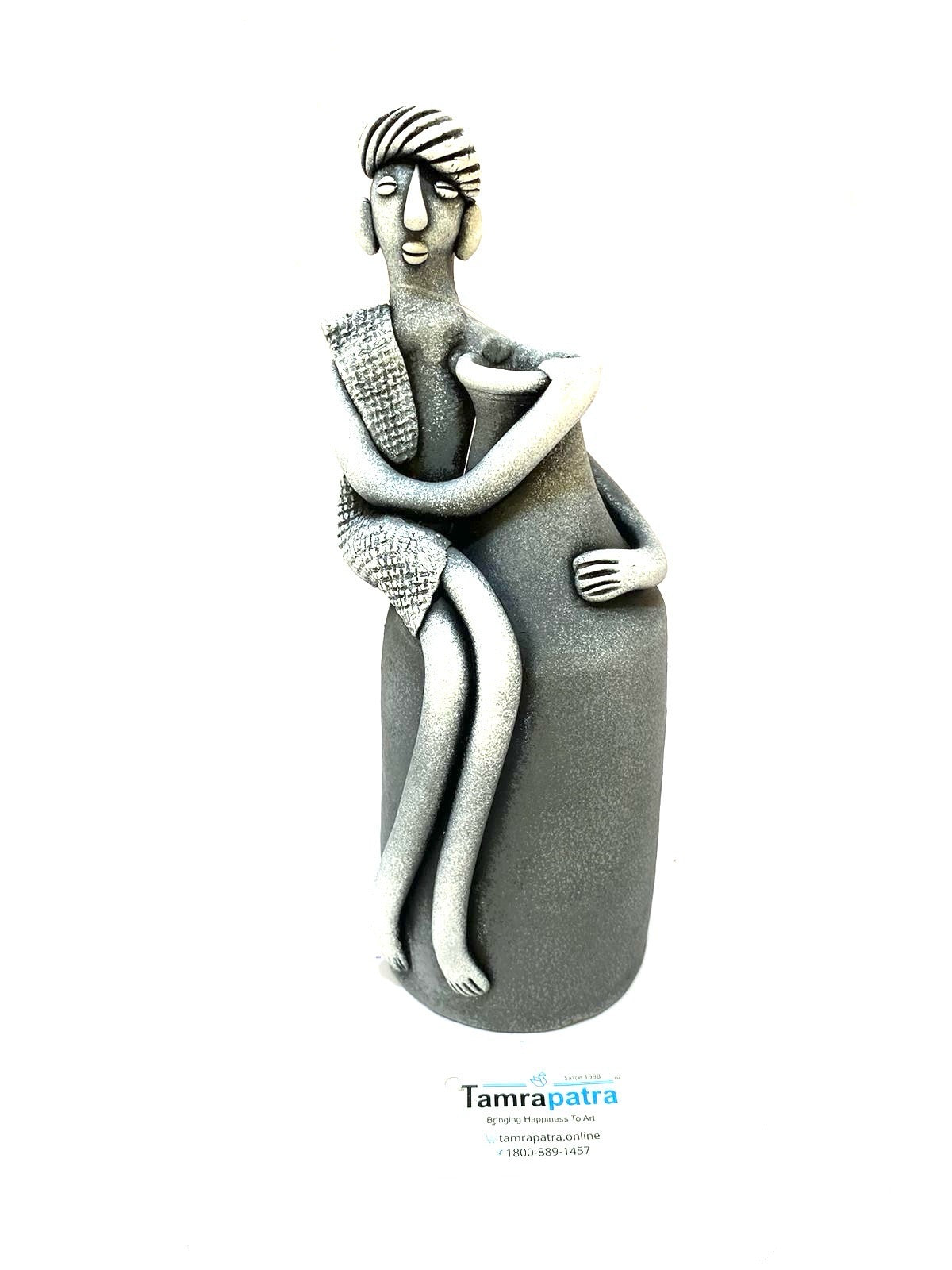 Tribal Man Sitting on Colorful Pot Exclusive Pottery Decoration By Tamrapatra - Tamrapatra