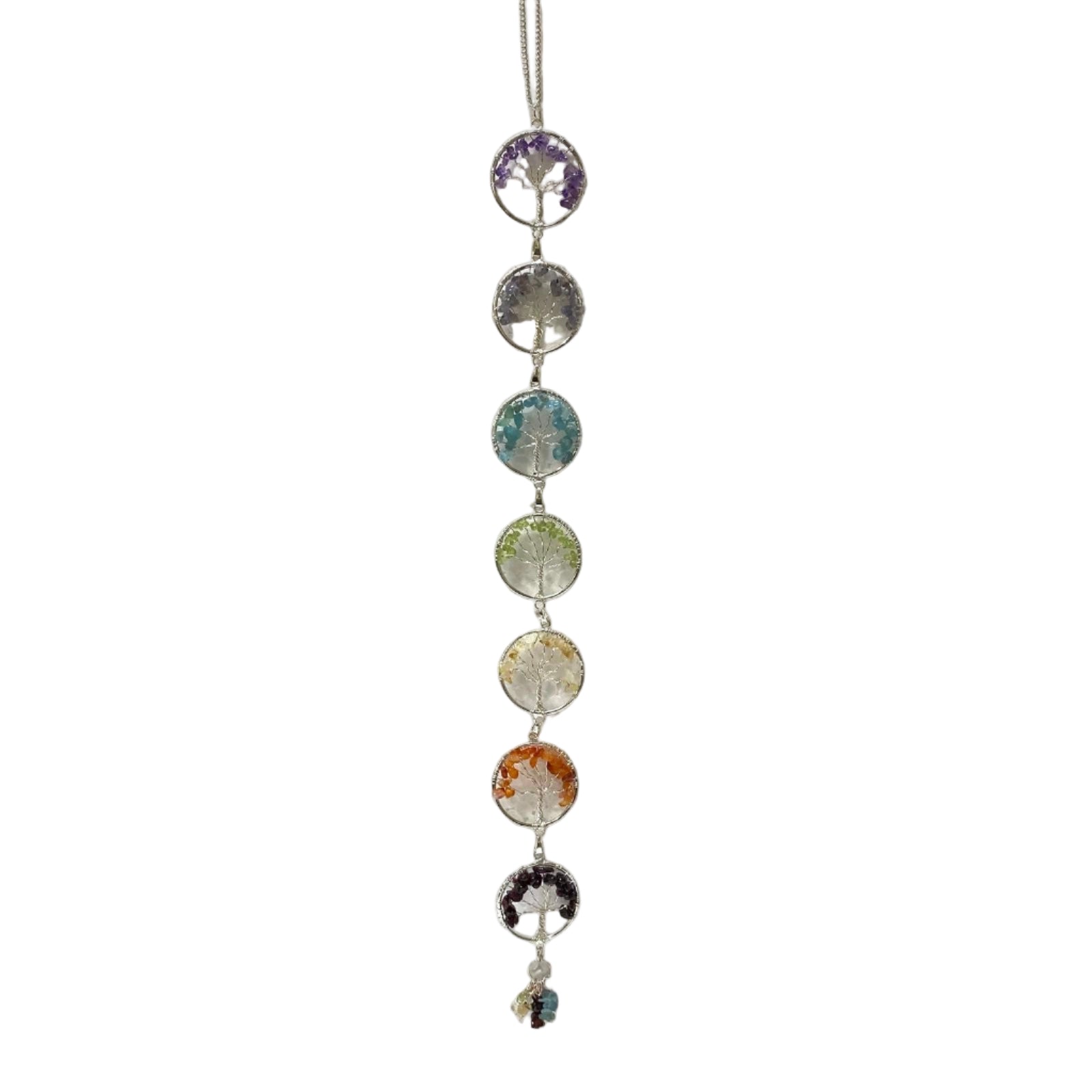Crystal pendant with colorful stones on a white background