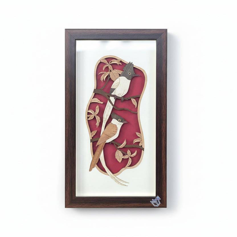 Framed artwork of birds on a white background with a red fabric background