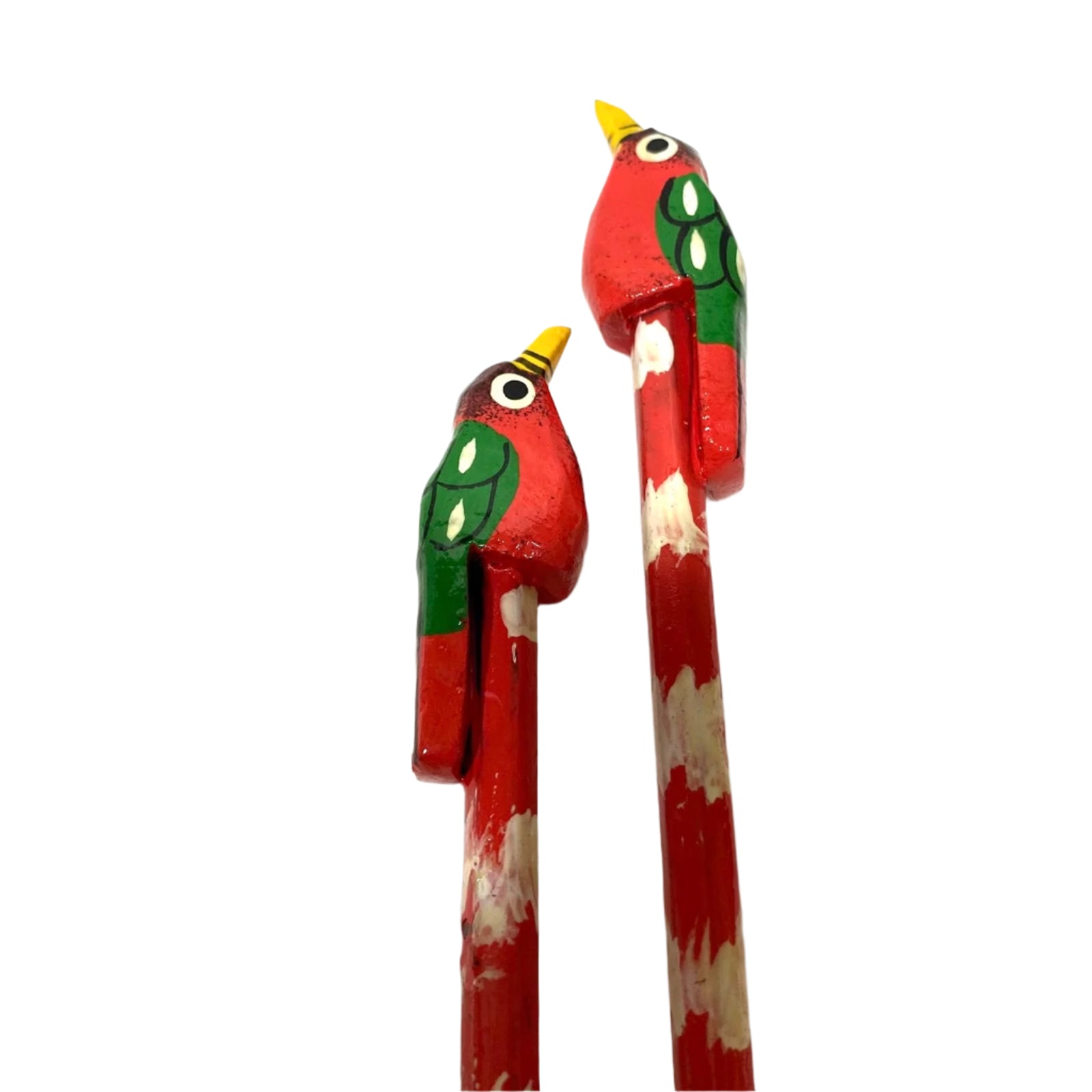 Two red bird-shaped pencils with green and yellow accents on a white background