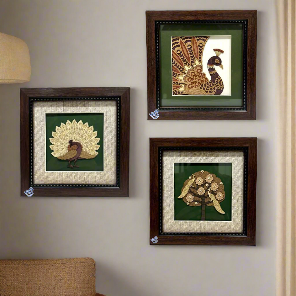 Three framed artworks of peacocks on a white background