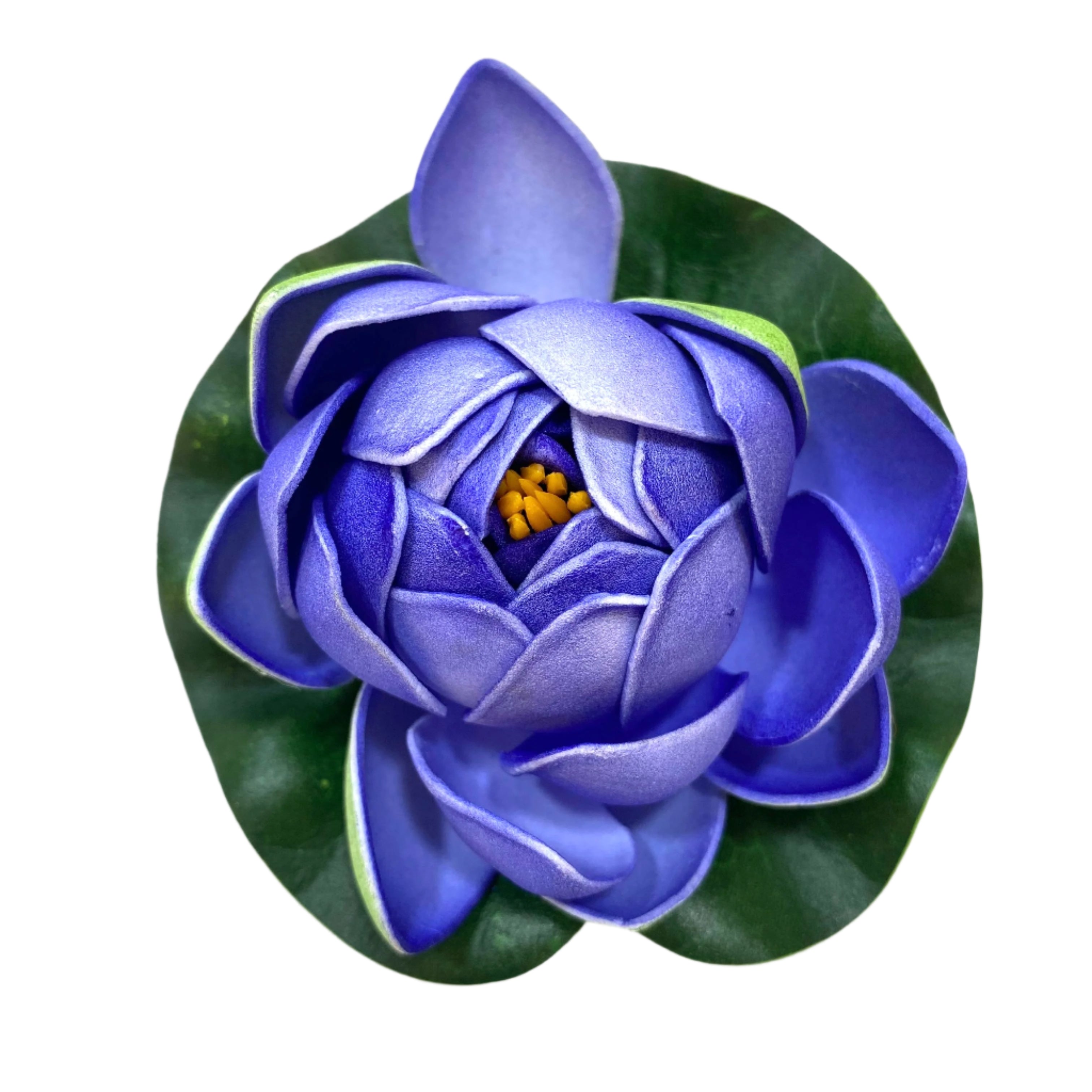 Purple artificial water lily flower on a white background