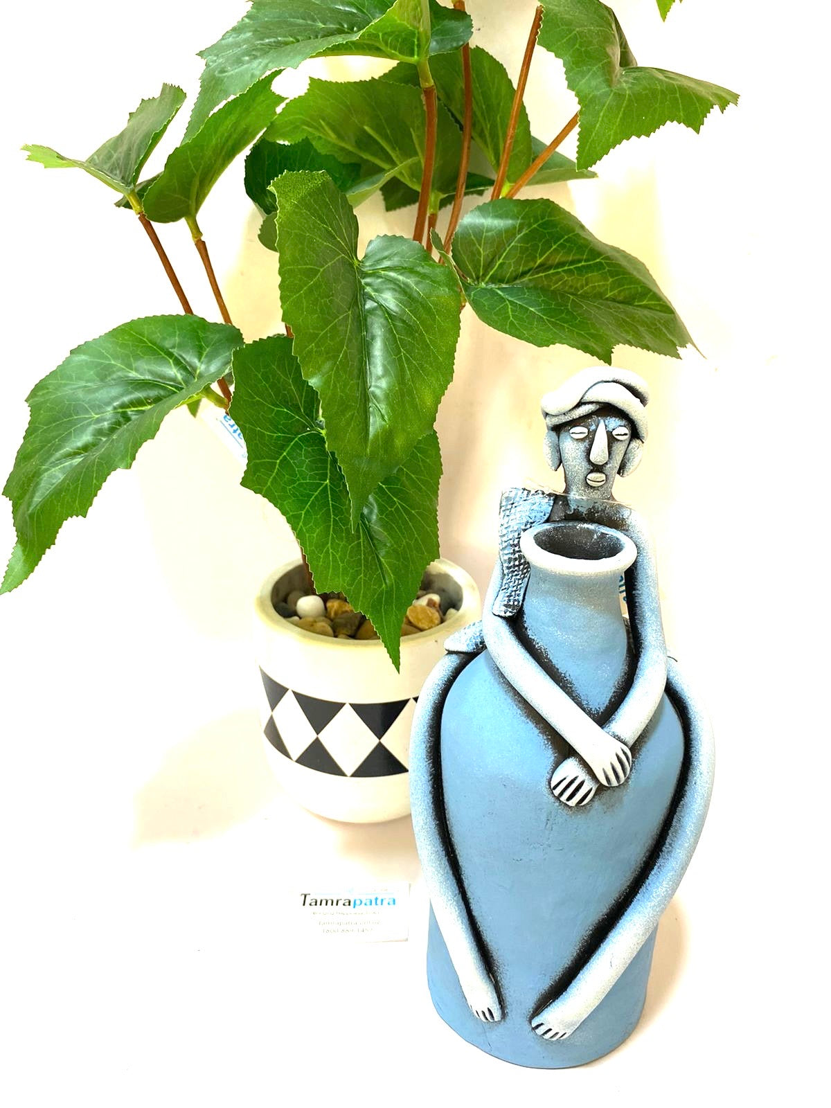 Tribal Man Sitting on Colorful Pot Exclusive Pottery Decoration By Tamrapatra - Tamrapatra