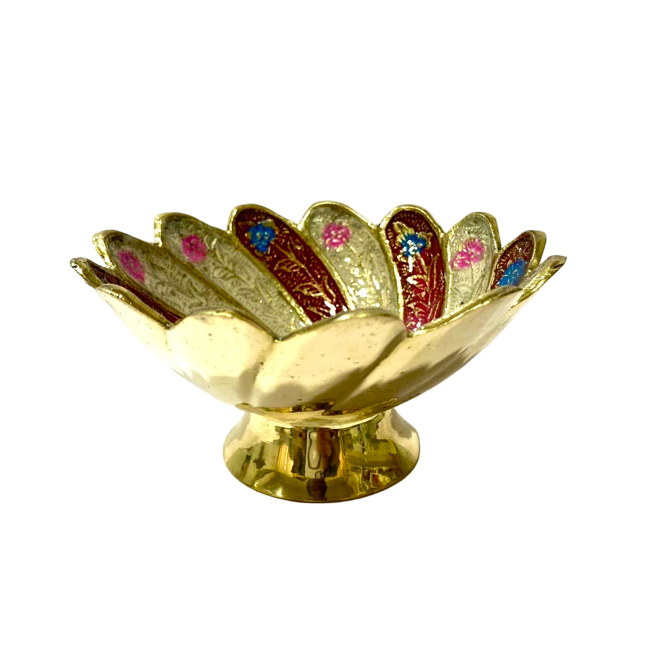 Decorative gold bowl with floral patterns on a white background