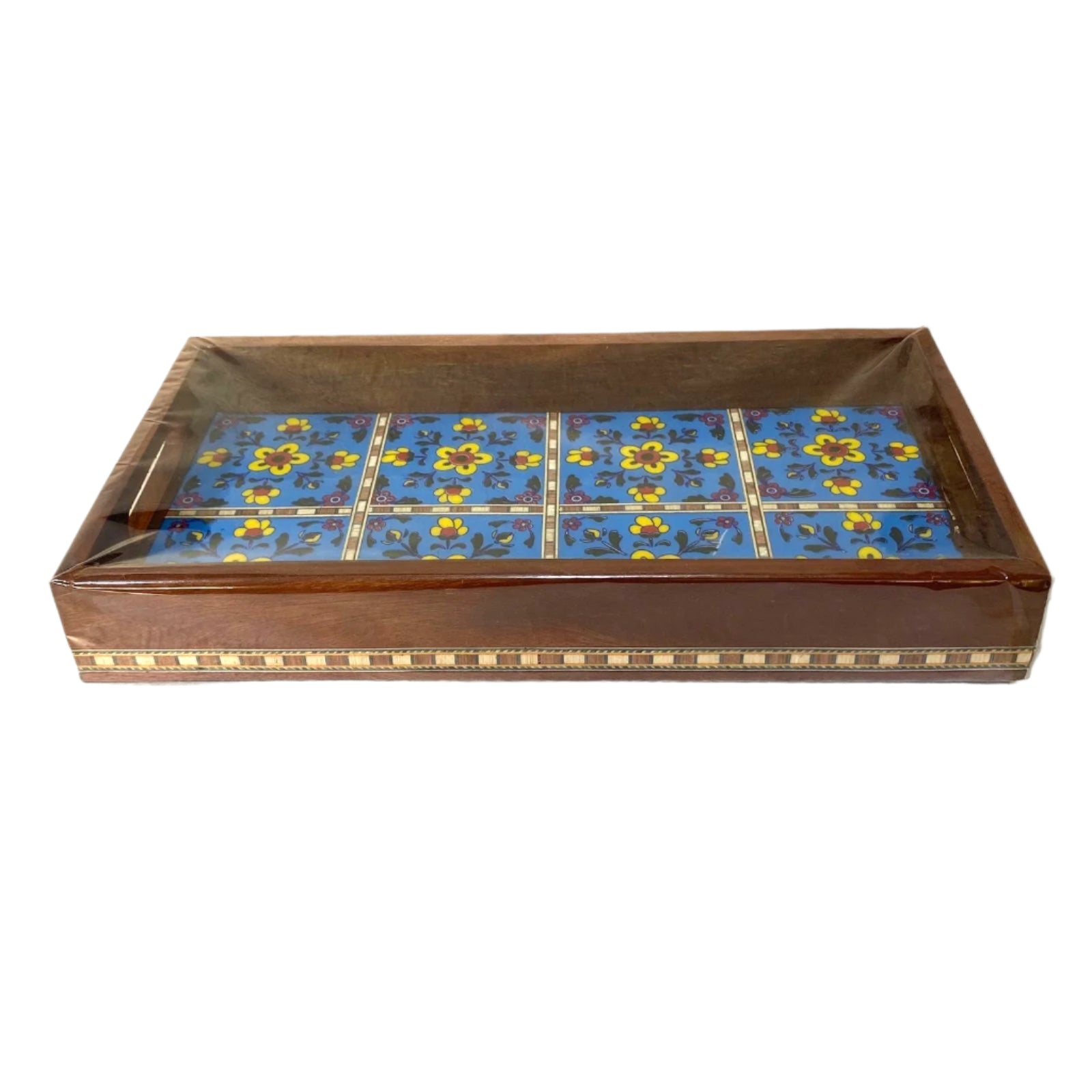 Decorative box with floral pattern on a white surface