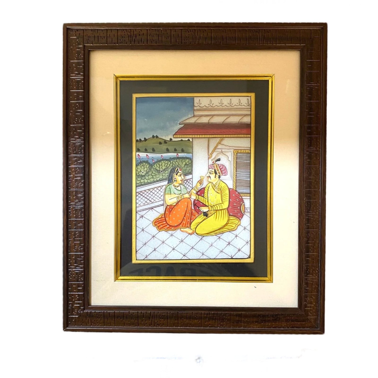 Framed artwork of two people on a balcony with a decorative brown frame.