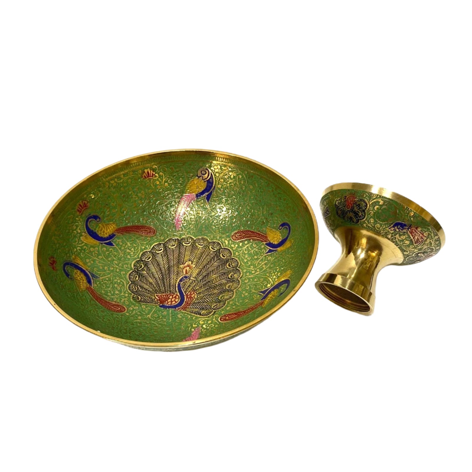 Decorative green dish with peacock design and a matching small cup on a white background
