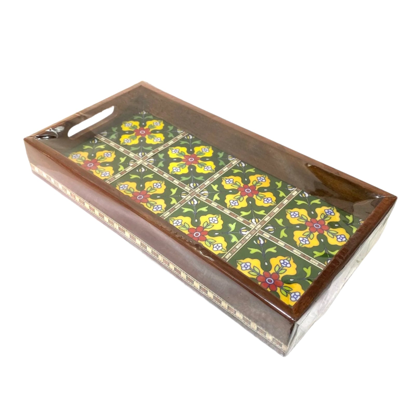 Decorative tray with floral pattern on a white surface
