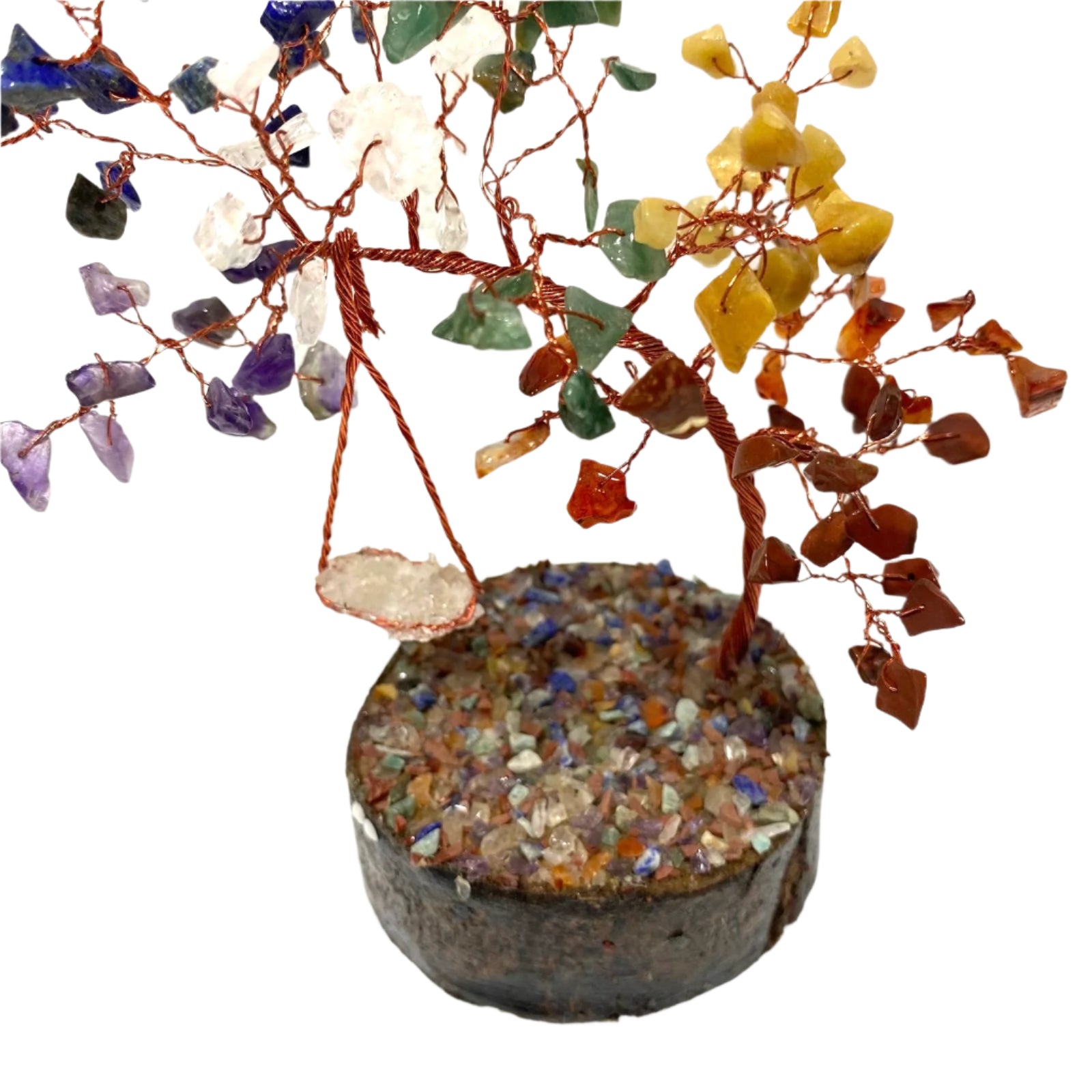 Decorative crystal tree with multicolored stones on a white background