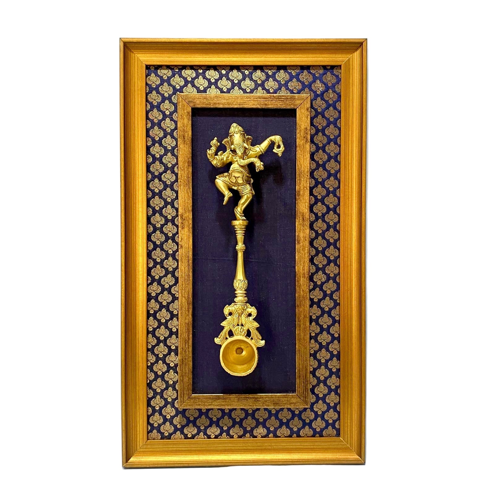 Decorative wall art with a gold figurine and frame on a blue background