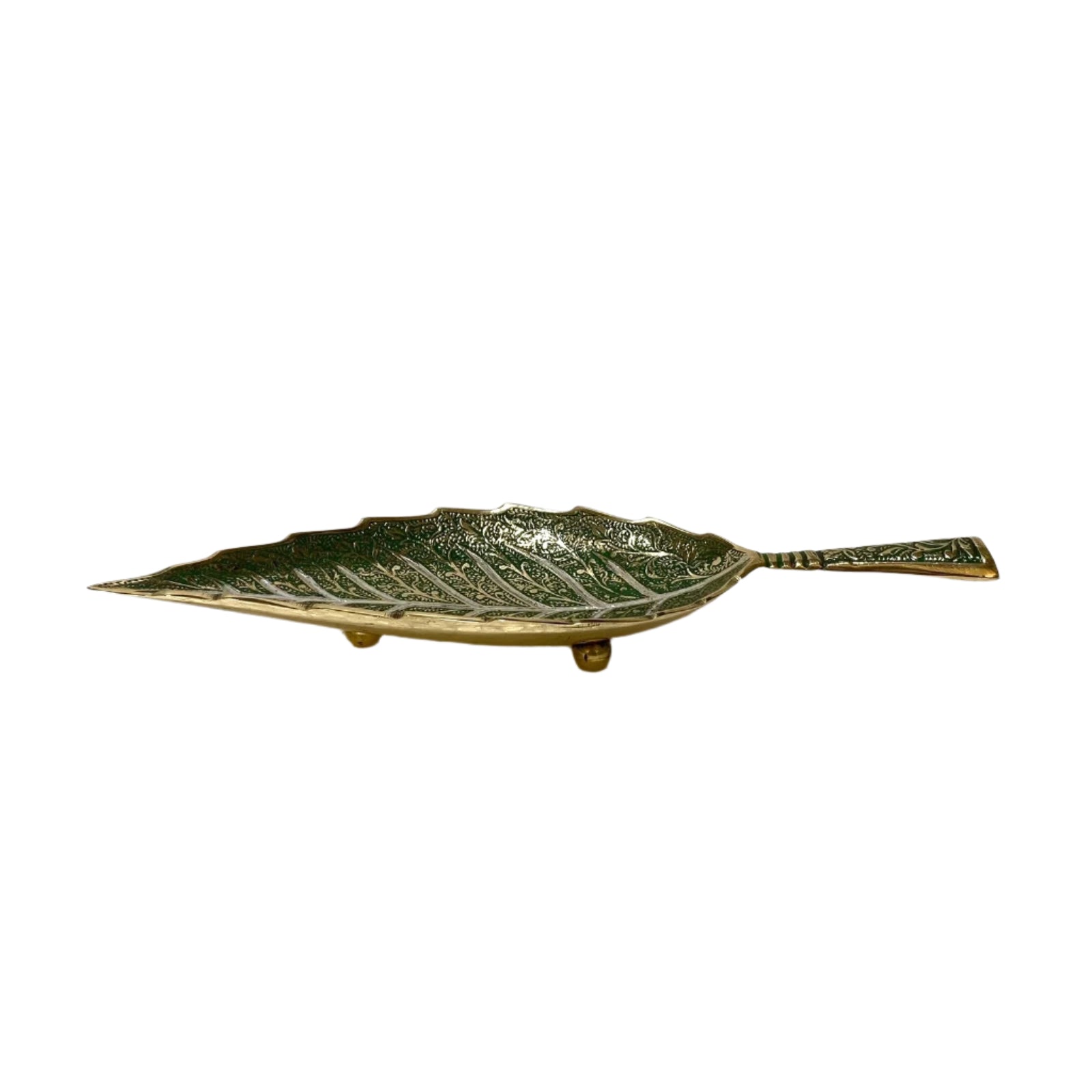 Decorative leaf-shaped metal tray on a white background