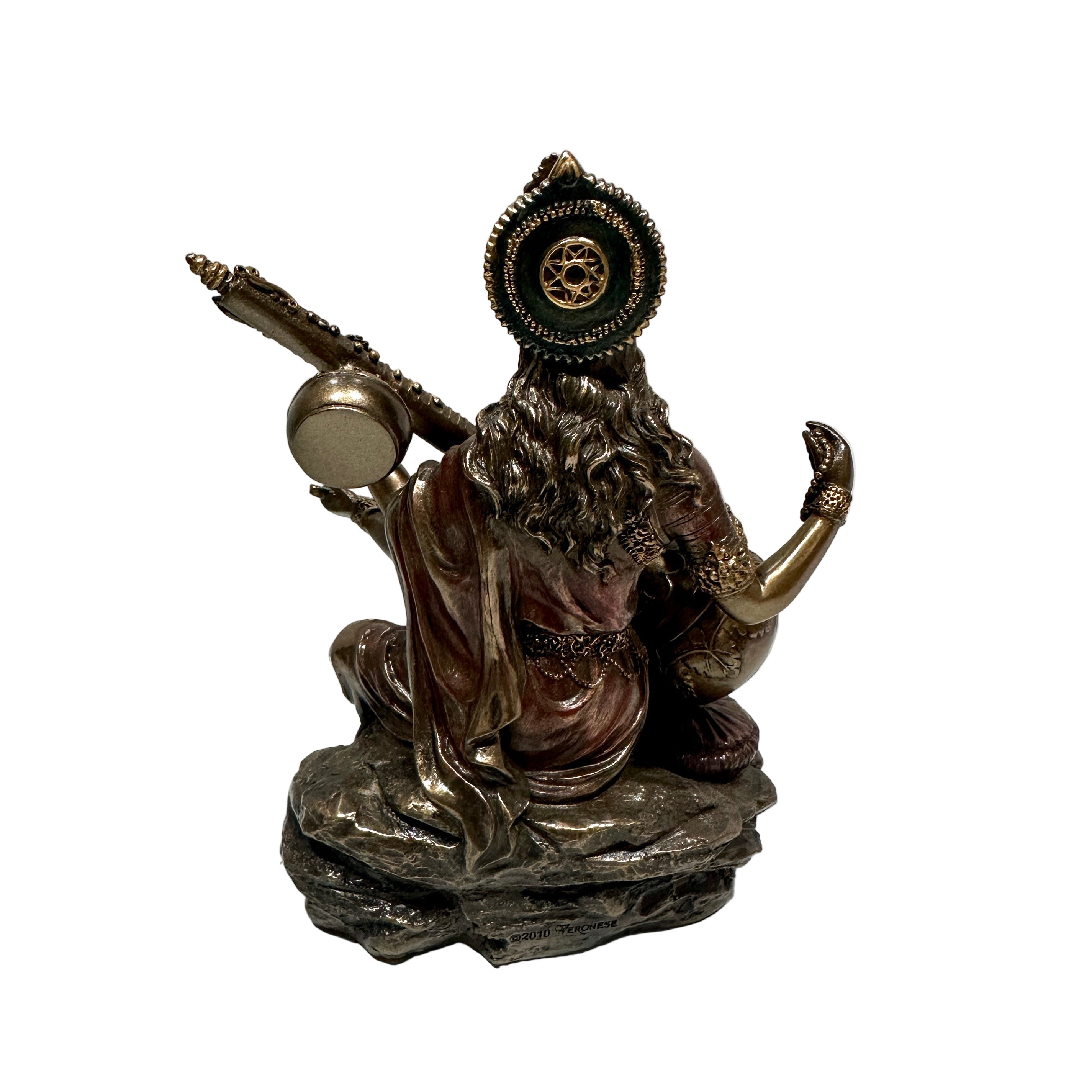 Statue of a seated figure with a headdress on a white background