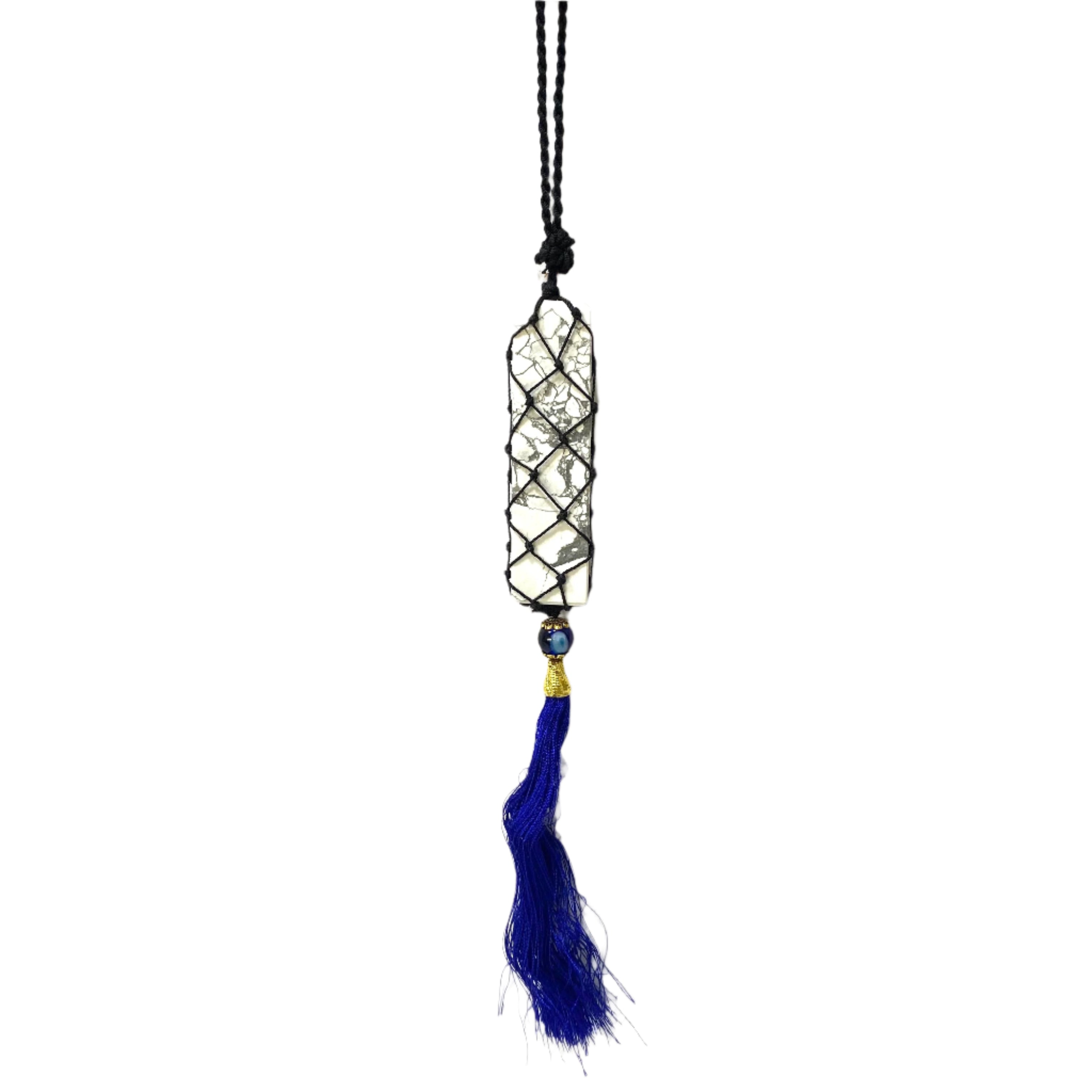 Decorative hanging with crystal grid and blue tassel on a white background