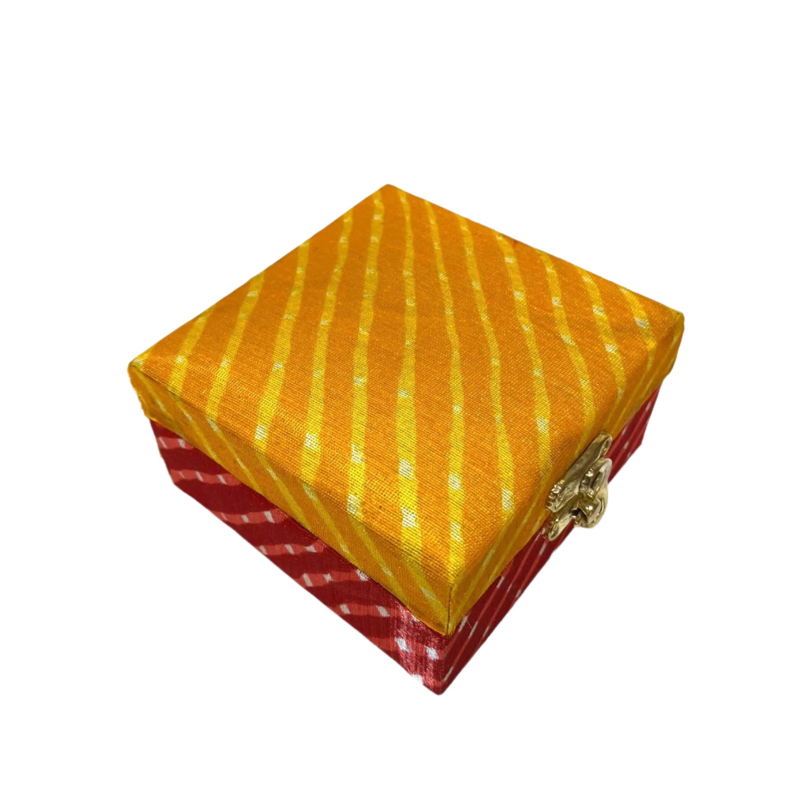 Two fabric-covered jewelry boxes, one yellow with a pattern and one red, on a textured white surface.