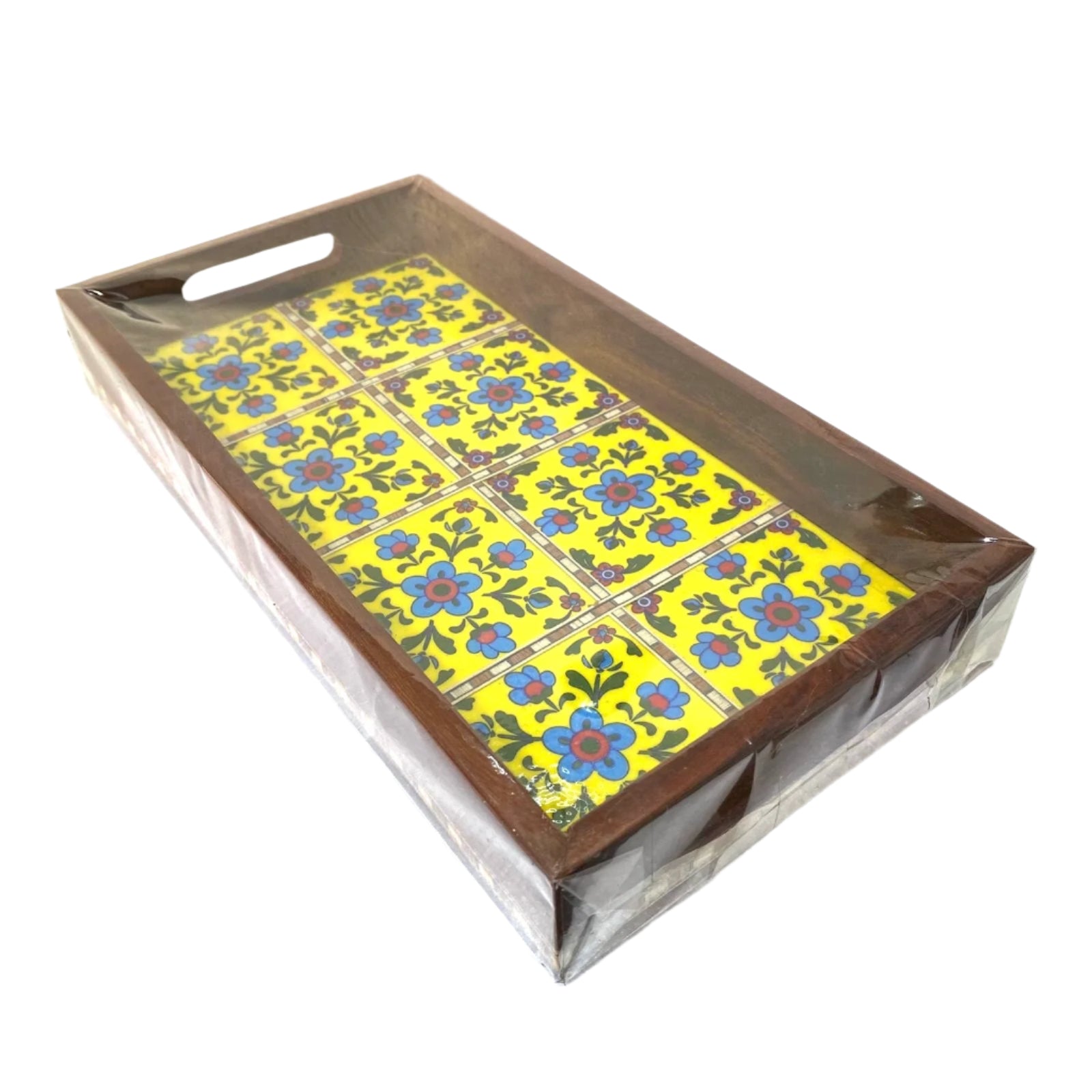 Decorative tray with floral pattern on a white surface