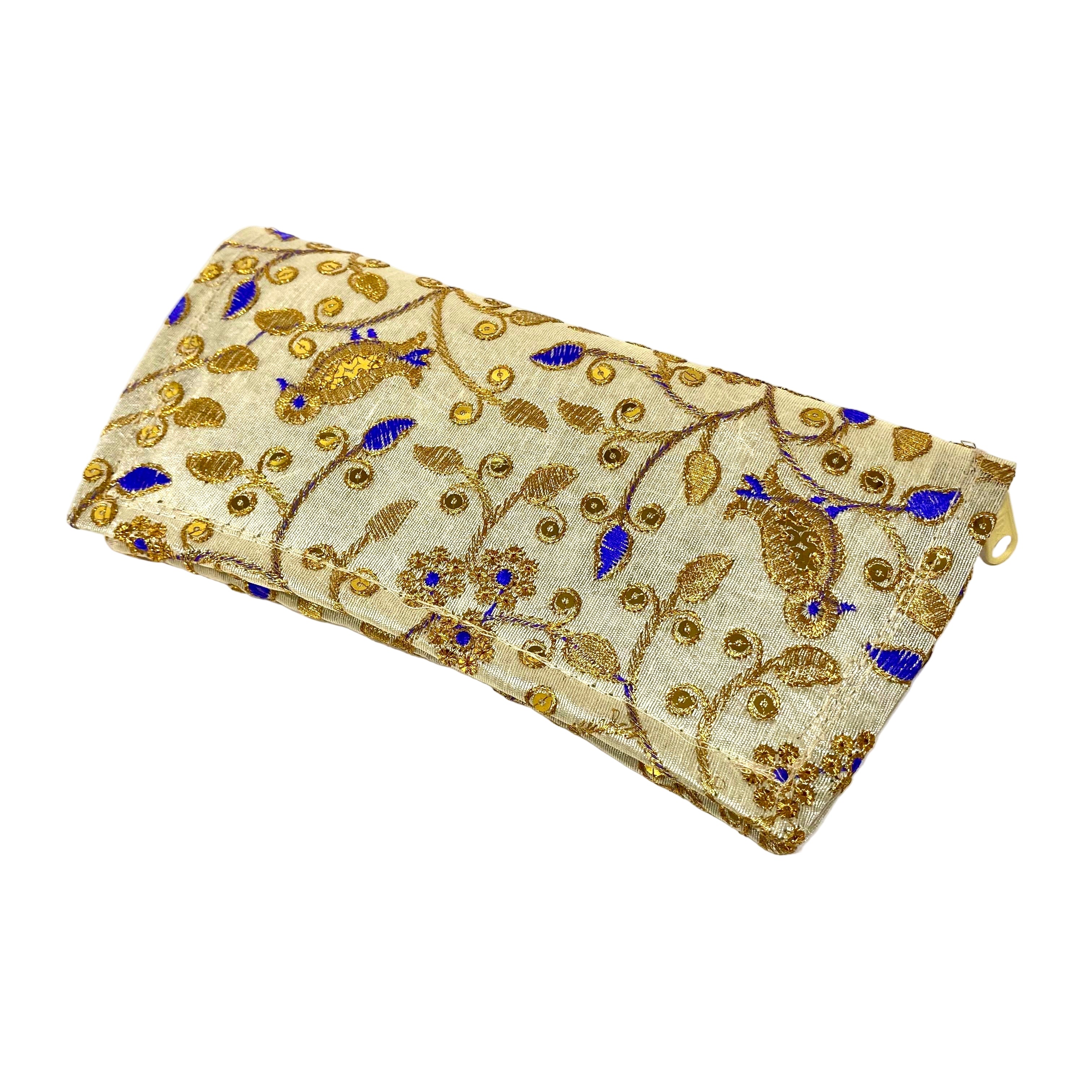 Decorative clutch with gold and blue patterns on a white background