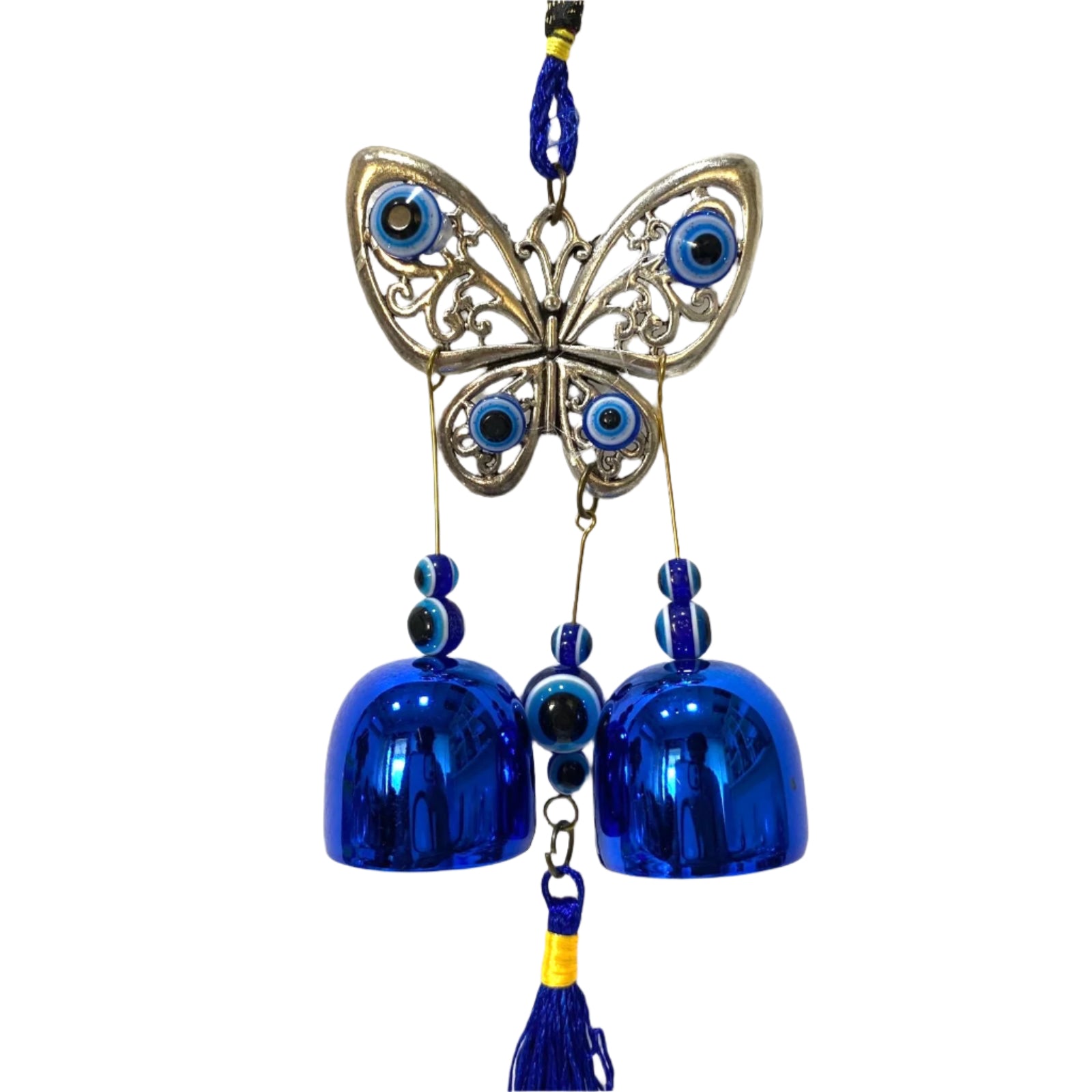 Butterfly-shaped ornament with blue bells and tassel on a textured white background