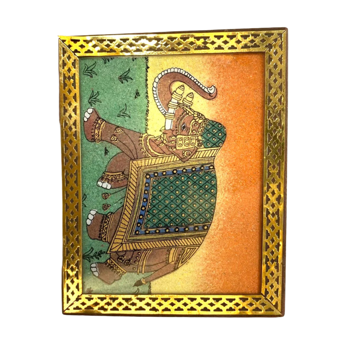 Decorative wall art with an elephant design in a gold frame on a textured white background