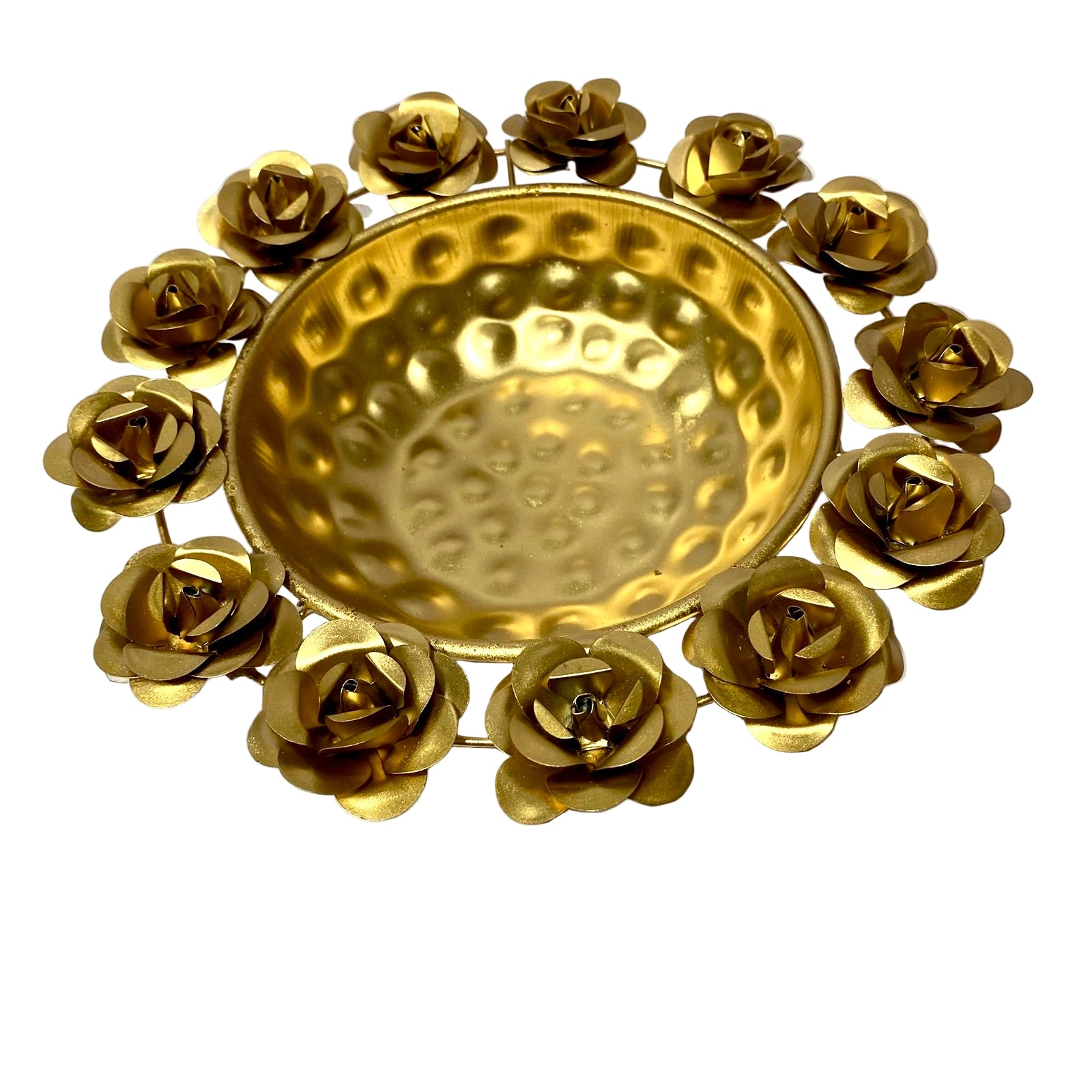 Decorative gold dish with floral designs on a white background