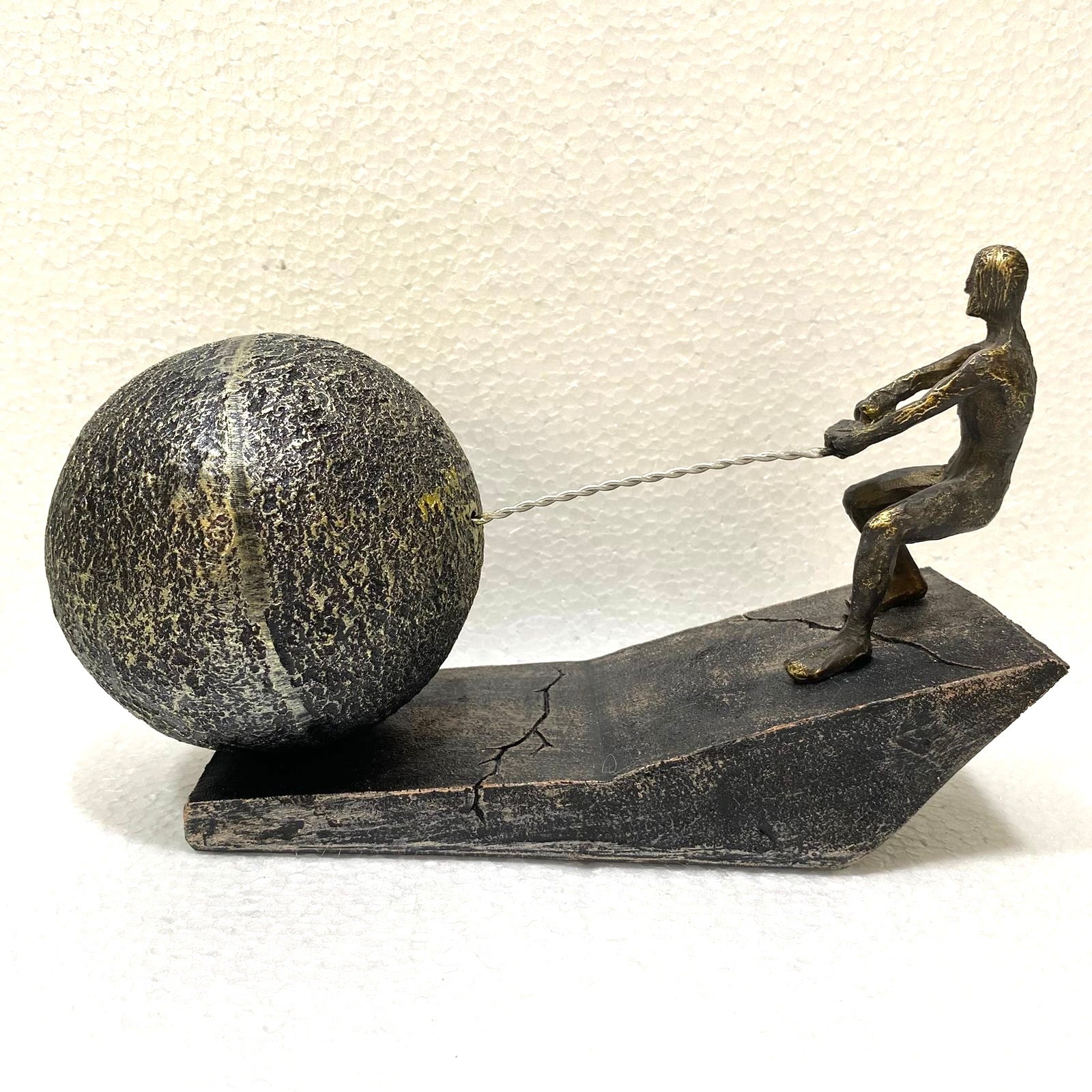 Unique Formation Of Man Pulling Rock Modern Showpiece Décor By Tamrapatra