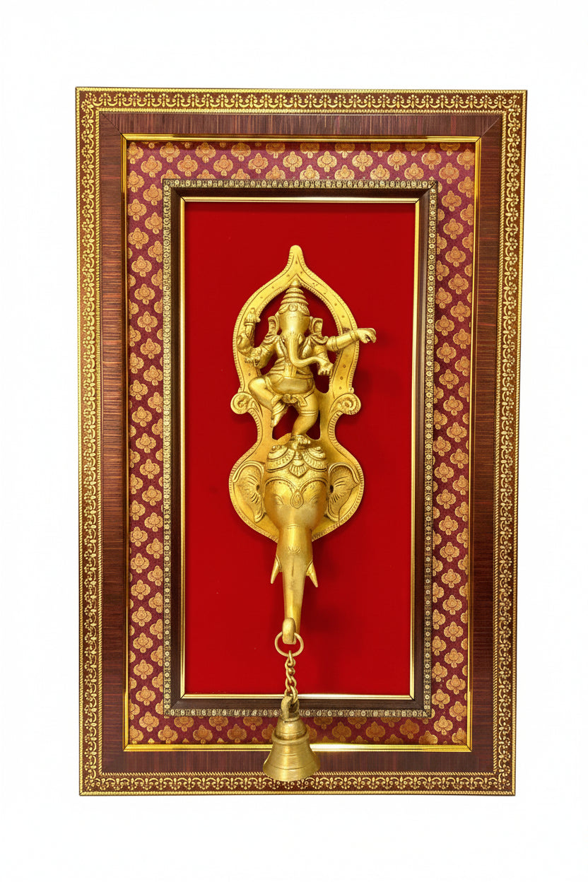 Decorative wall art with a gold deity figure on a red background, framed in brown.