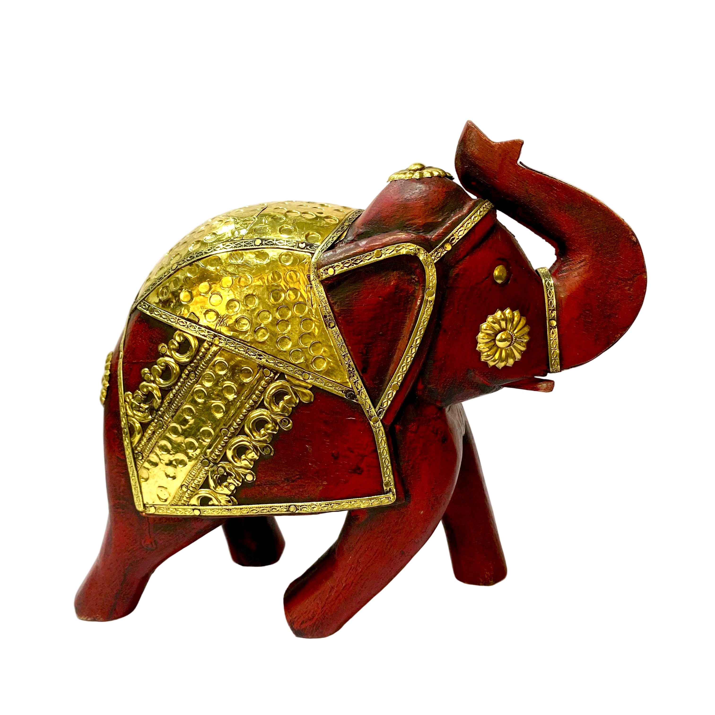 Decorative elephant figurine with gold embellishments on a white background