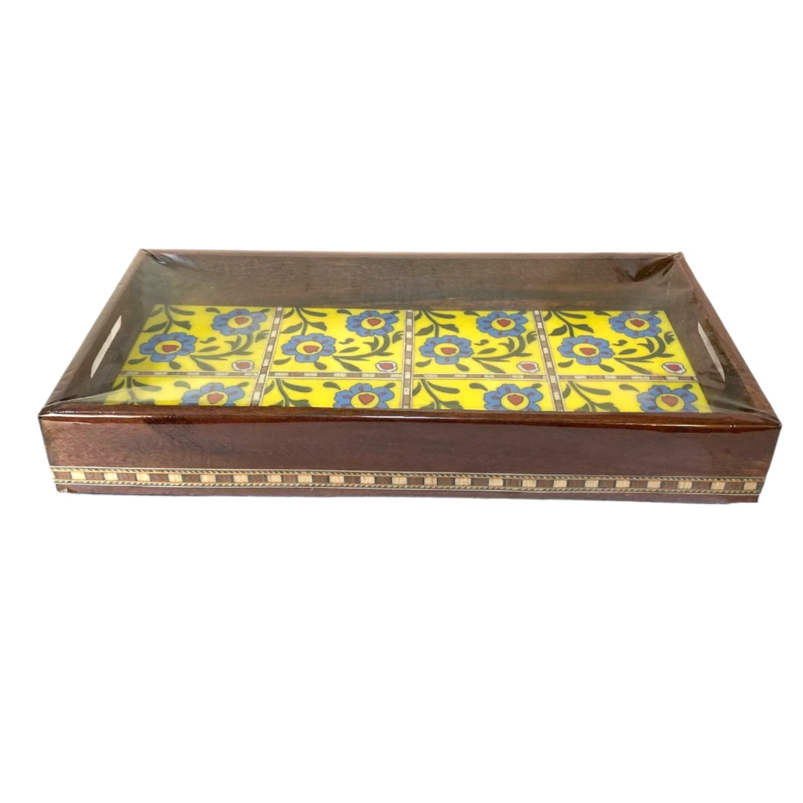 Decorative wooden box with floral pattern on a white surface