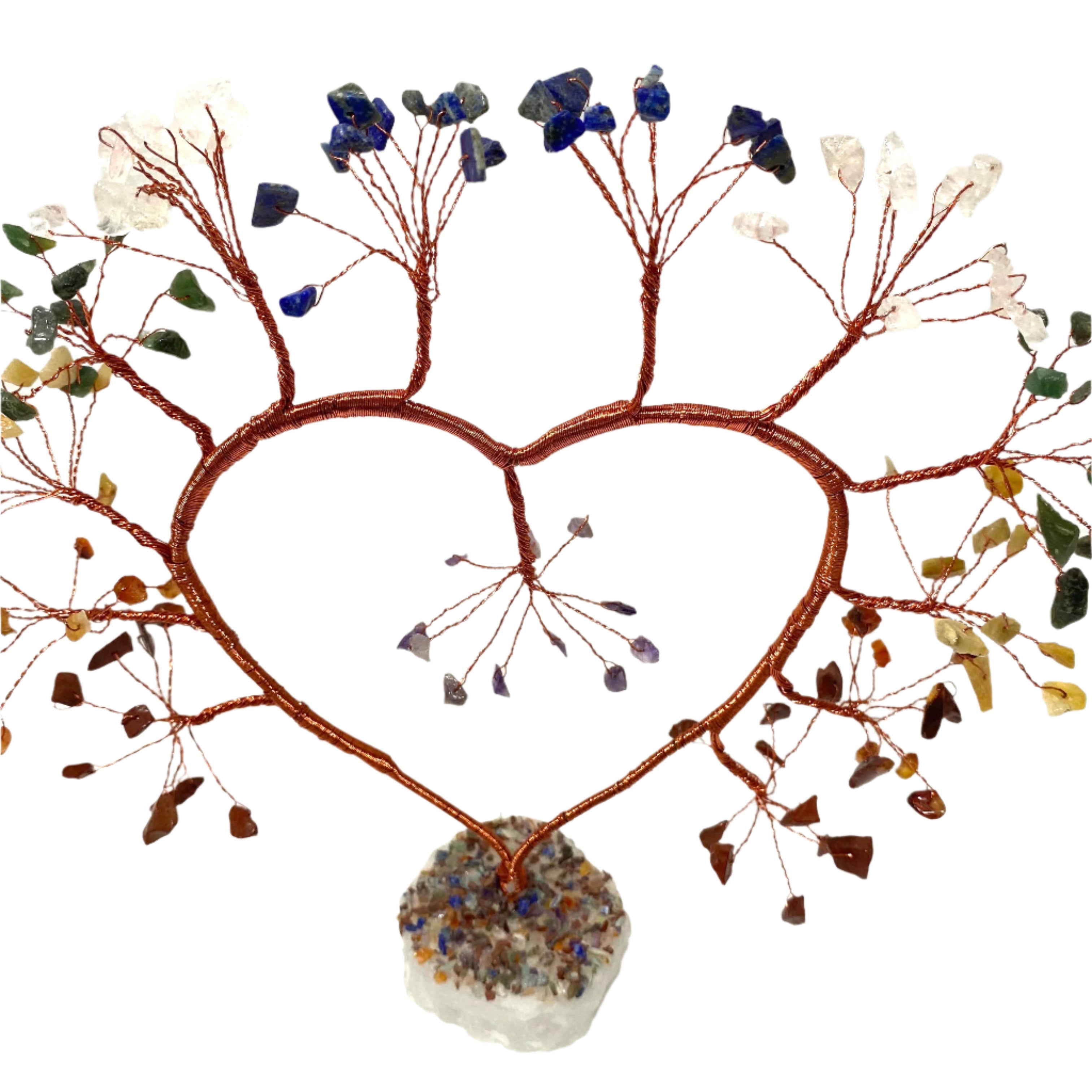 Decorative heart-shaped piece with branches and stones on a textured white background