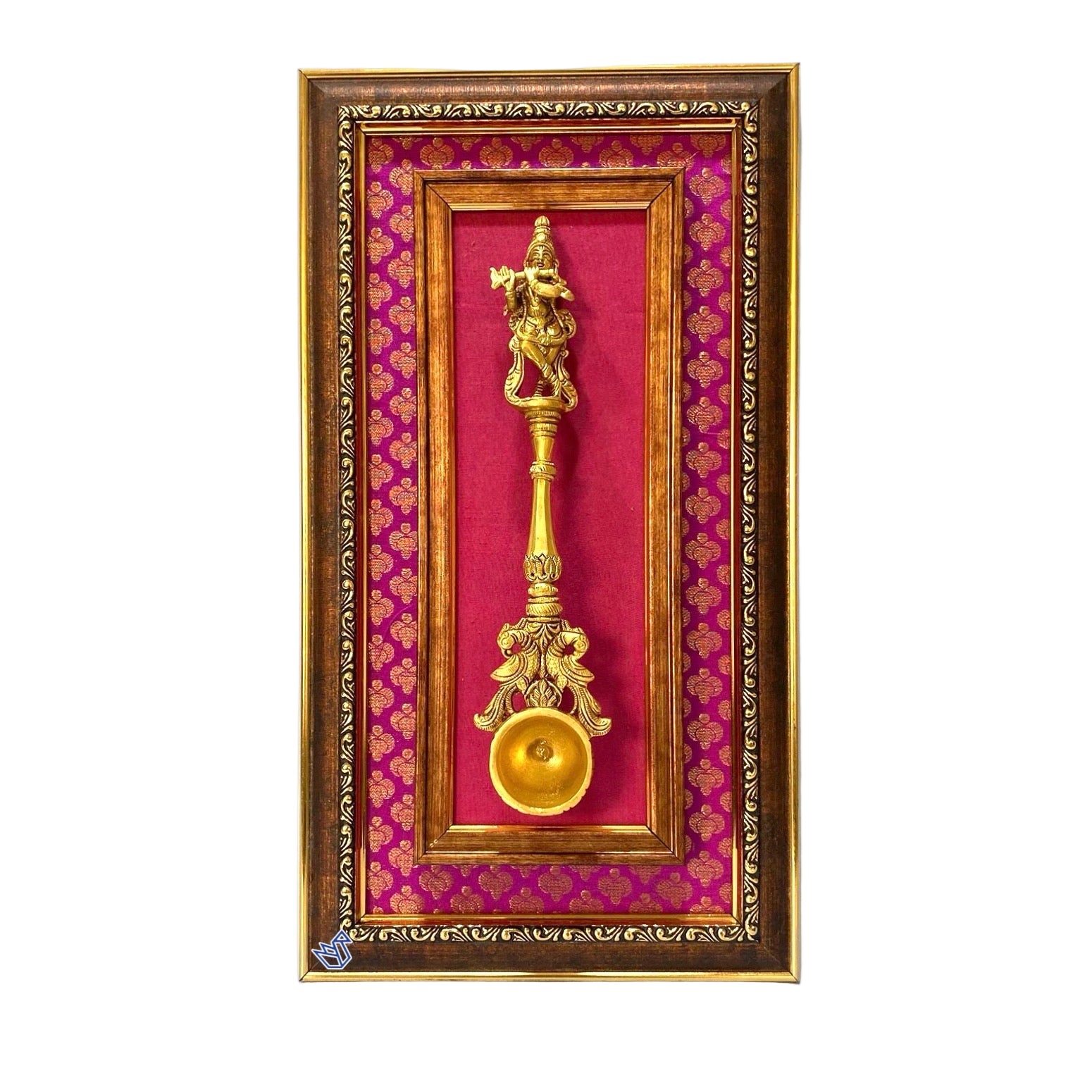Decorative wall art with a gold ornate object on a red background inside a wooden frame.