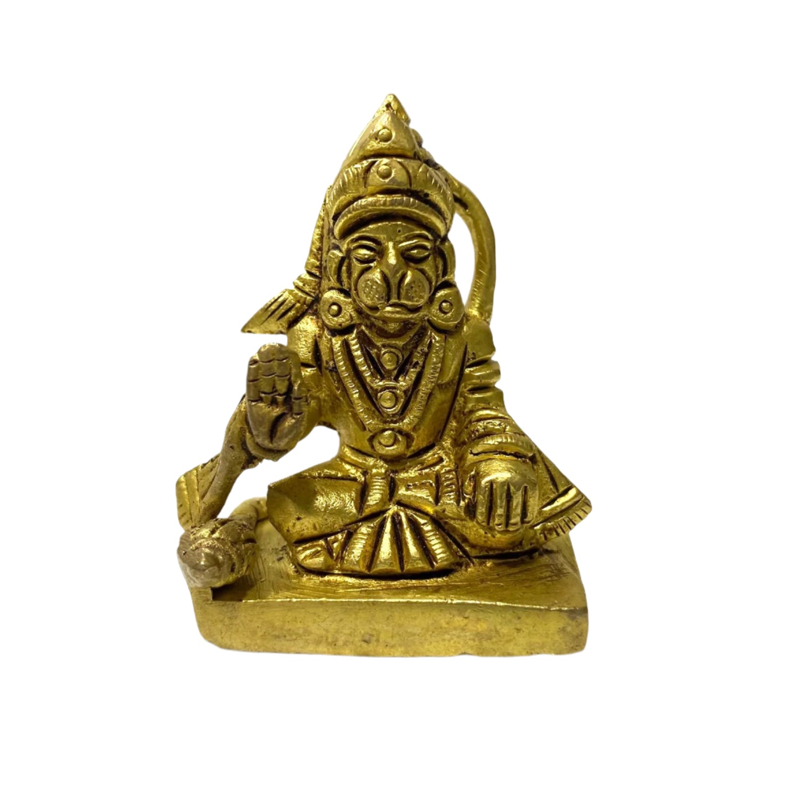Brass statue of a deity on a white background
