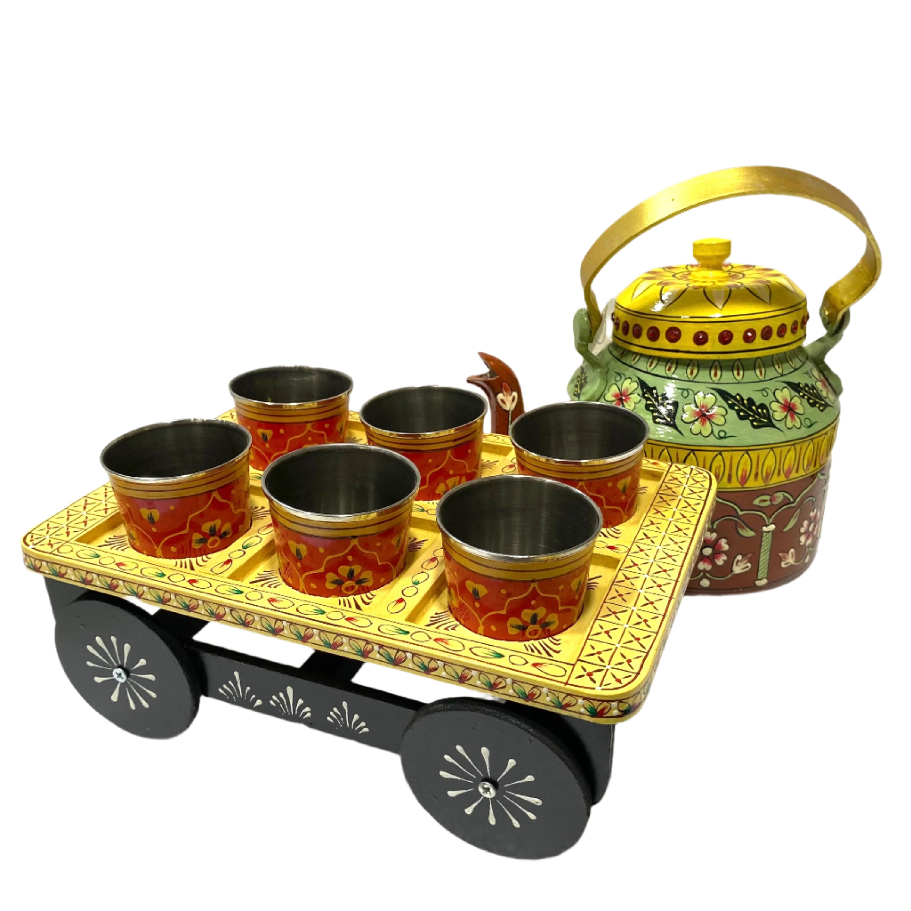 Decorative tea set with a teapot and cups on a tray against a white background