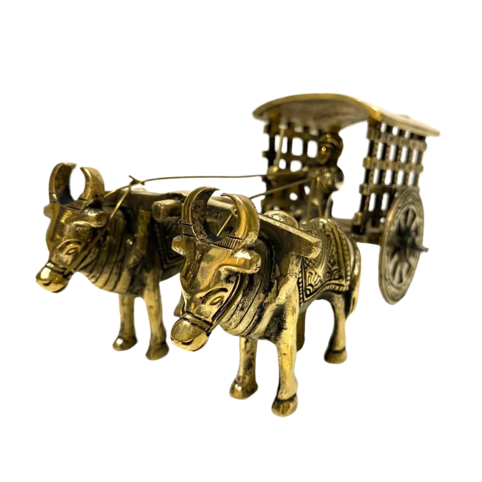 Bronze sculpture of two oxen pulling a cart on a white background